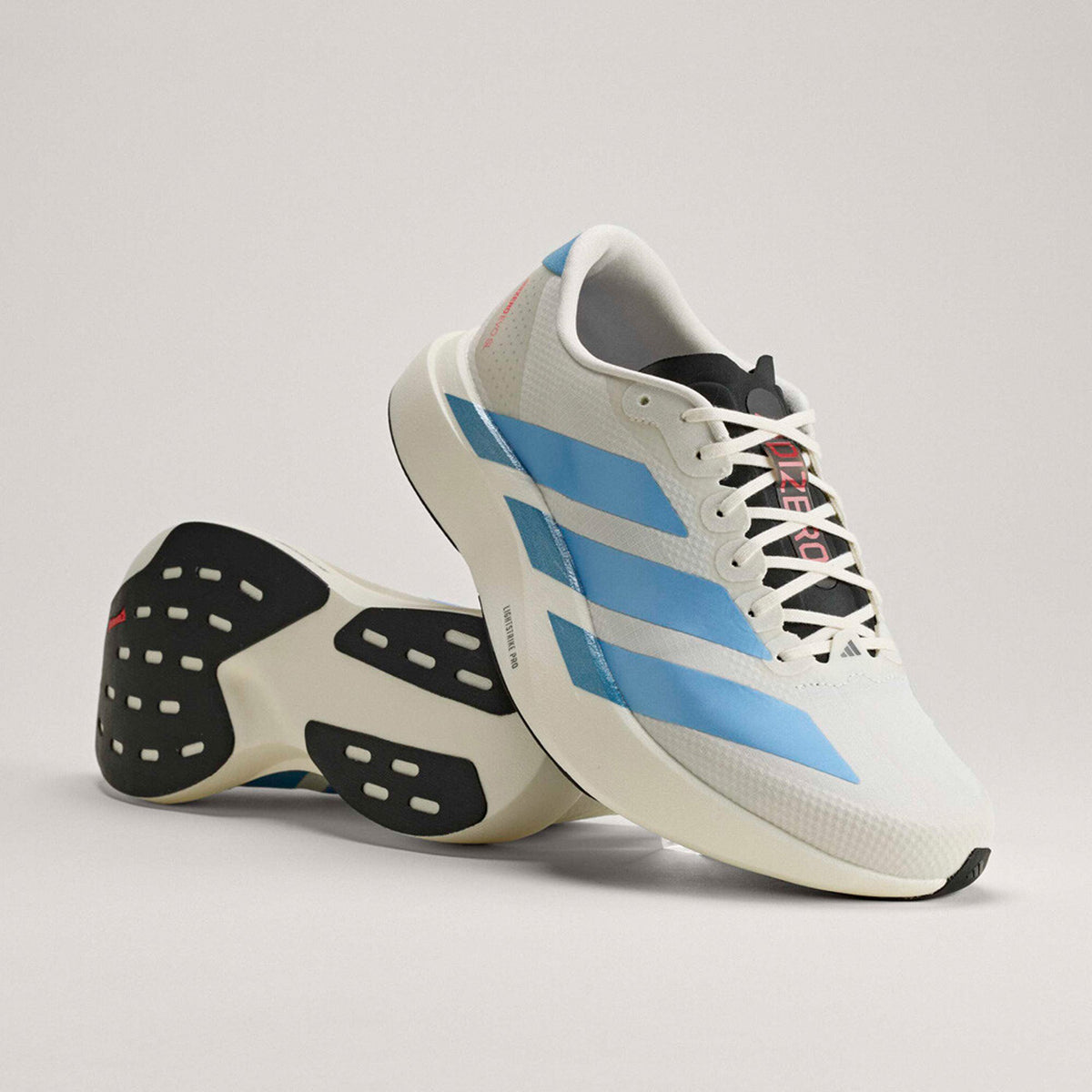 Men's adidas Adizero EVO SL Woven Running Shoes Off White Light Blue Bright Red angled side view of pair showing LIGHTSTRIKE PRO foam with Continental rubber and woven racing-inspired design for fast culture and versatile wear