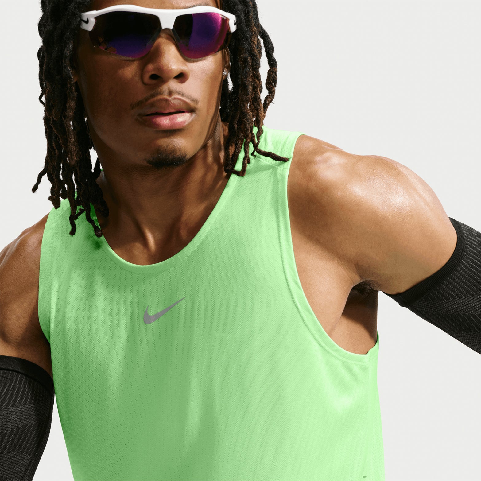 Men's Nike Aero-FIT Running Vest Volt Light Silver Reflective Silver close-up of strategic mesh zones showing Aero-FIT maximum breathability technology with lightweight knit construction for active cooling during running