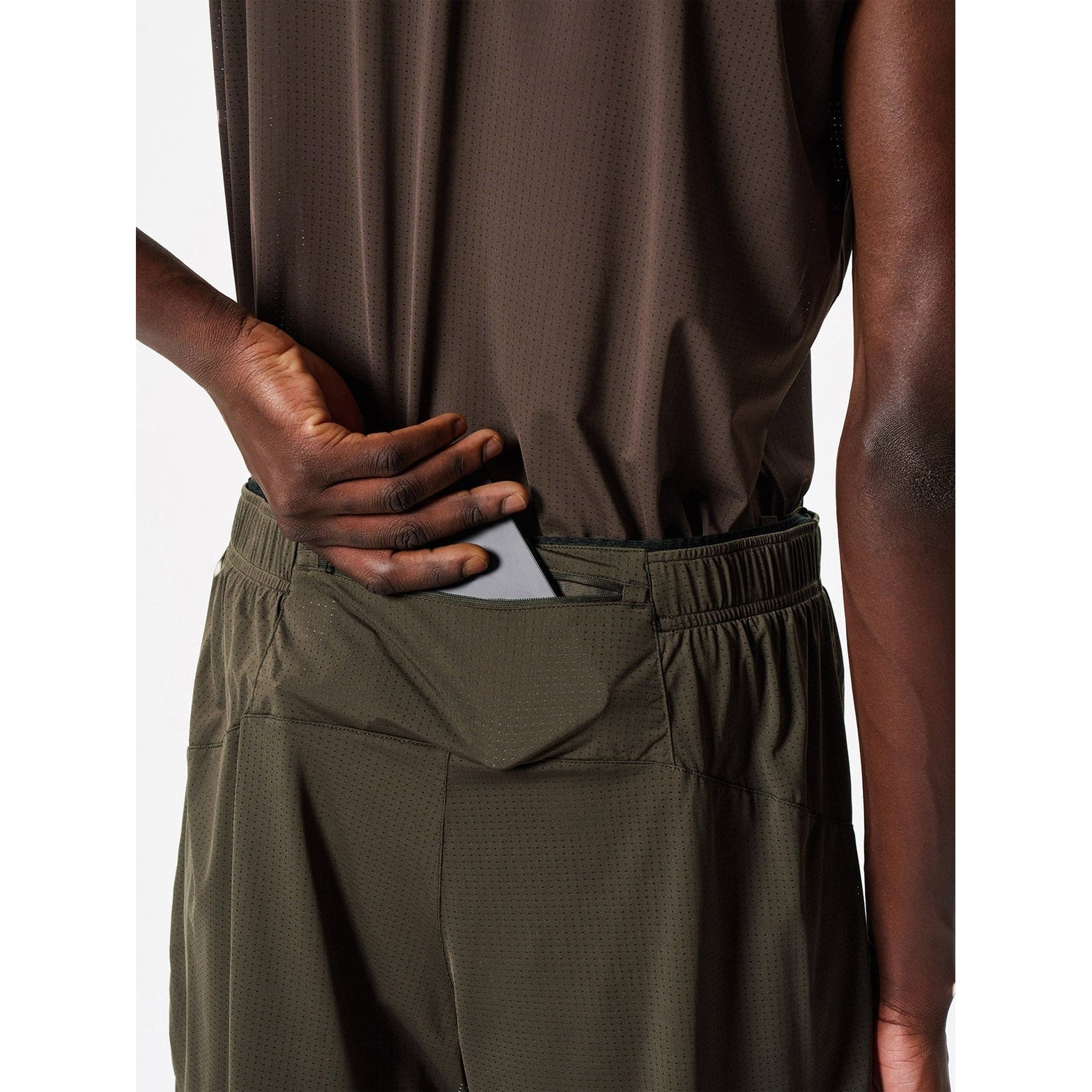 Goldwin Men's Air Pit Storage Shorts Jet Brown close-up of back pocket showing smartphone storage capacity