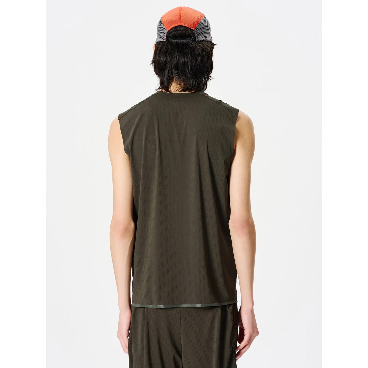 Goldwin Men's Air Pit Tank Jet Brown back view on male model showing reflective strips for low-light visibility and dot-structured mesh fabric for standalone wear