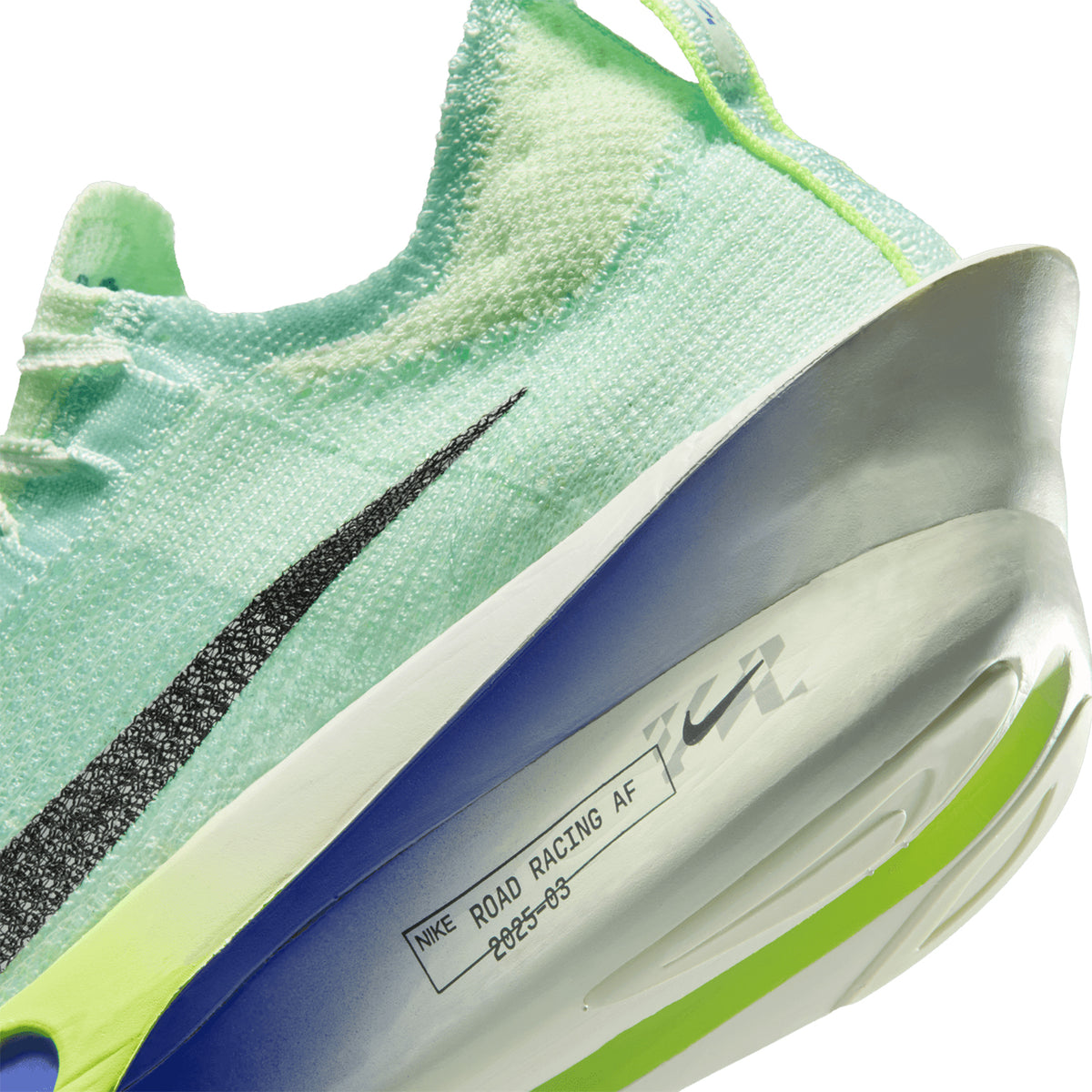Nike Alphafly 3 men's running shoe in Barely Green / Volt Tint / Volt Ice / Black Spruce — angled side view showing barely green Atomknit upper with volt tint detailing, full-length carbon fiber plate geometry and volt ice fully connected ZoomX foam midsole stack