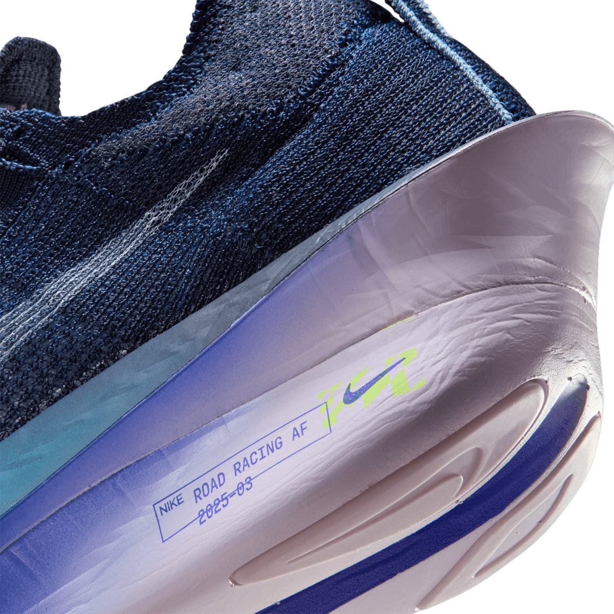 Nike Alphafly 3 men's running shoe in Obsidian / Doll / Persian Violet / White — angled side view showing obsidian Atomknit upper with persian violet detailing, full-length carbon fiber plate geometry and doll fully connected ZoomX foam midsole stack