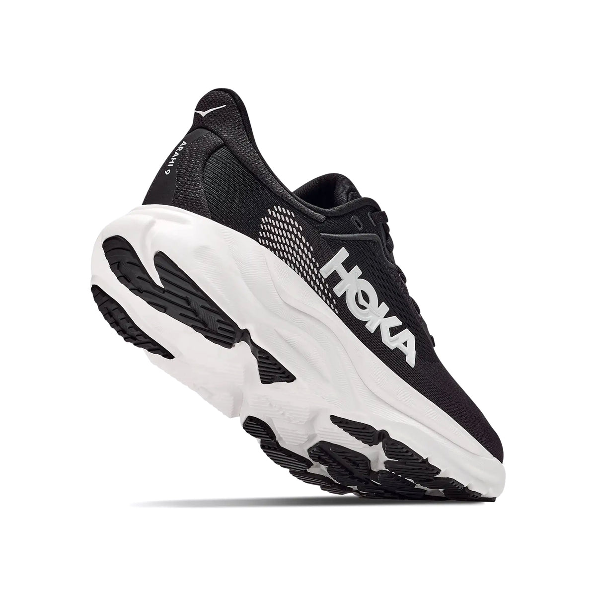 Men's HOKA Arahi 9 Wide Fit Running Shoes Black White angled side and heel view showing enhanced H-Frame stability system with dual-density EVA foam, wide fit construction and super abrasion rubber outsole for plush cushioned daily stability running