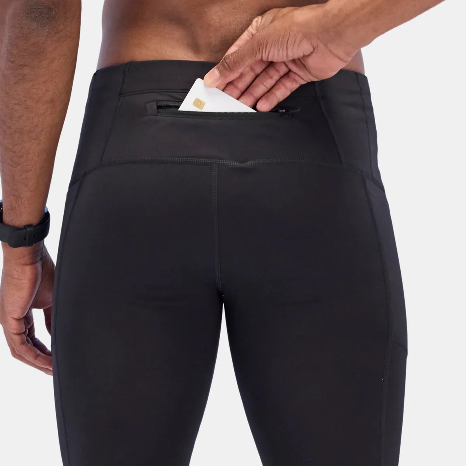 Bandit men's Brushed Stamina tights black back closeup featuring zippered iPhone-sized centre-back pocket for secure storage
