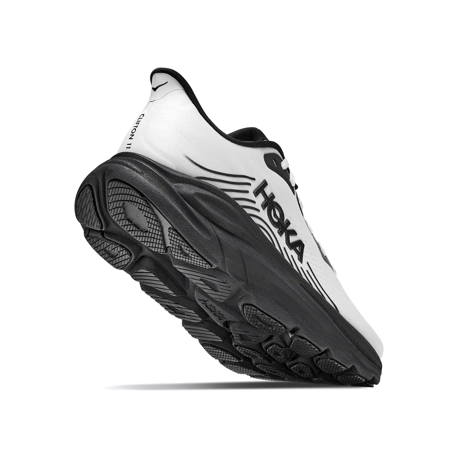 Men's HOKA Clifton 11 Running Shoes White Black angled side and heel view showing compression moulded EVA foam with MetaRocker geometry and durable outsole for effortless plush daily road running
