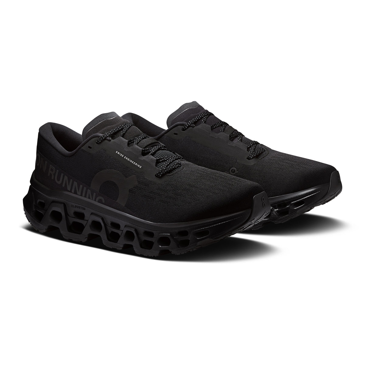 Men's On Cloudmonster 3 Running Shoes Black Black angled side view showing triple-layer CloudTec cushioning, enhanced rocker geometry and Speedboard propulsion