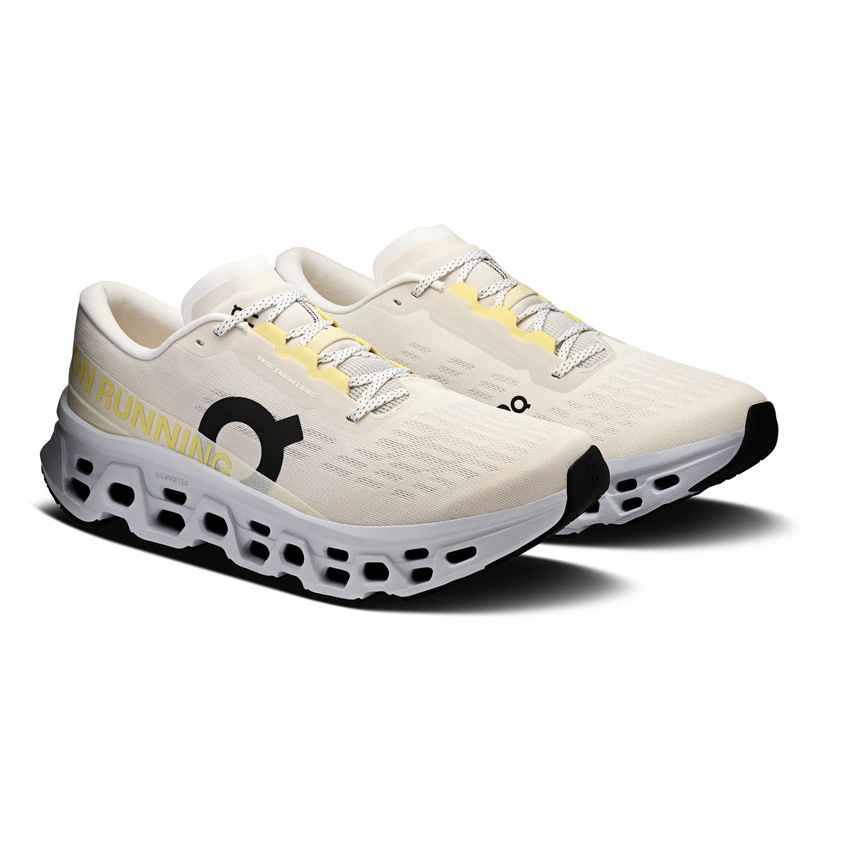 Men's On Cloudmonster 3 Running Shoes Ghost Glacier angled side view of pair showing triple-layer CloudTec foam with Helion cushioning, enhanced rocker shape and compressed rubber outsole for maximum cushioned responsive daily running