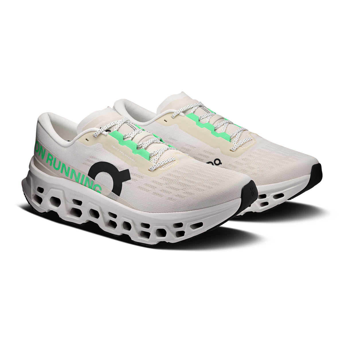 Men's On Cloudmonster 3 Running Shoes Ivory Ivory angled side view of pair showing triple-layer CloudTec foam with Helion cushioning, enhanced rocker shape and compressed rubber outsole for maximum cushioned responsive daily running