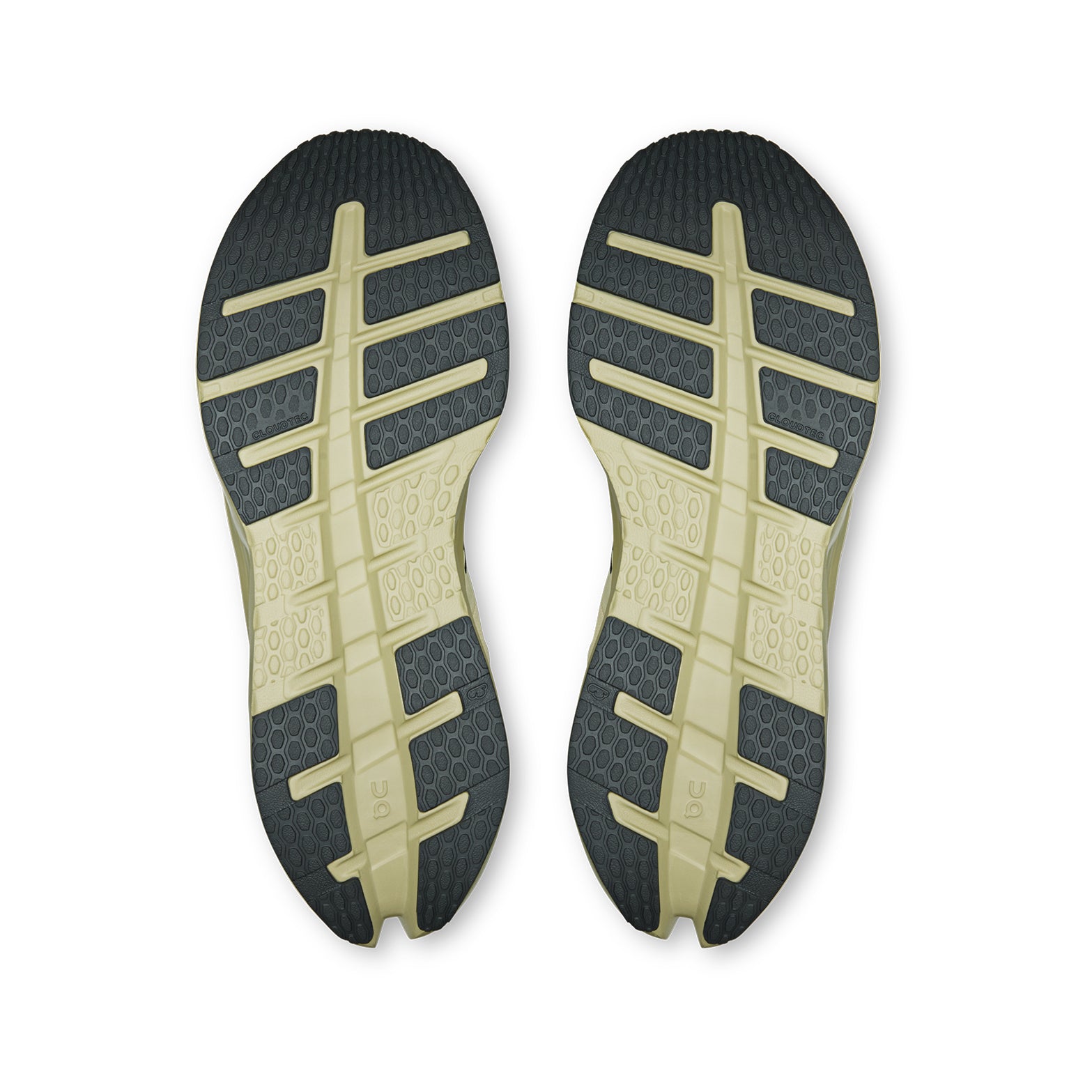 Two Men’s Cloudrunner 3 WP Running Shoes by On in Pollen and Haze are displayed with their light green and black soles facing up, emphasizing the textured grip patterns and grooves engineered for exceptional traction and CloudTec stability, all set against a white background.