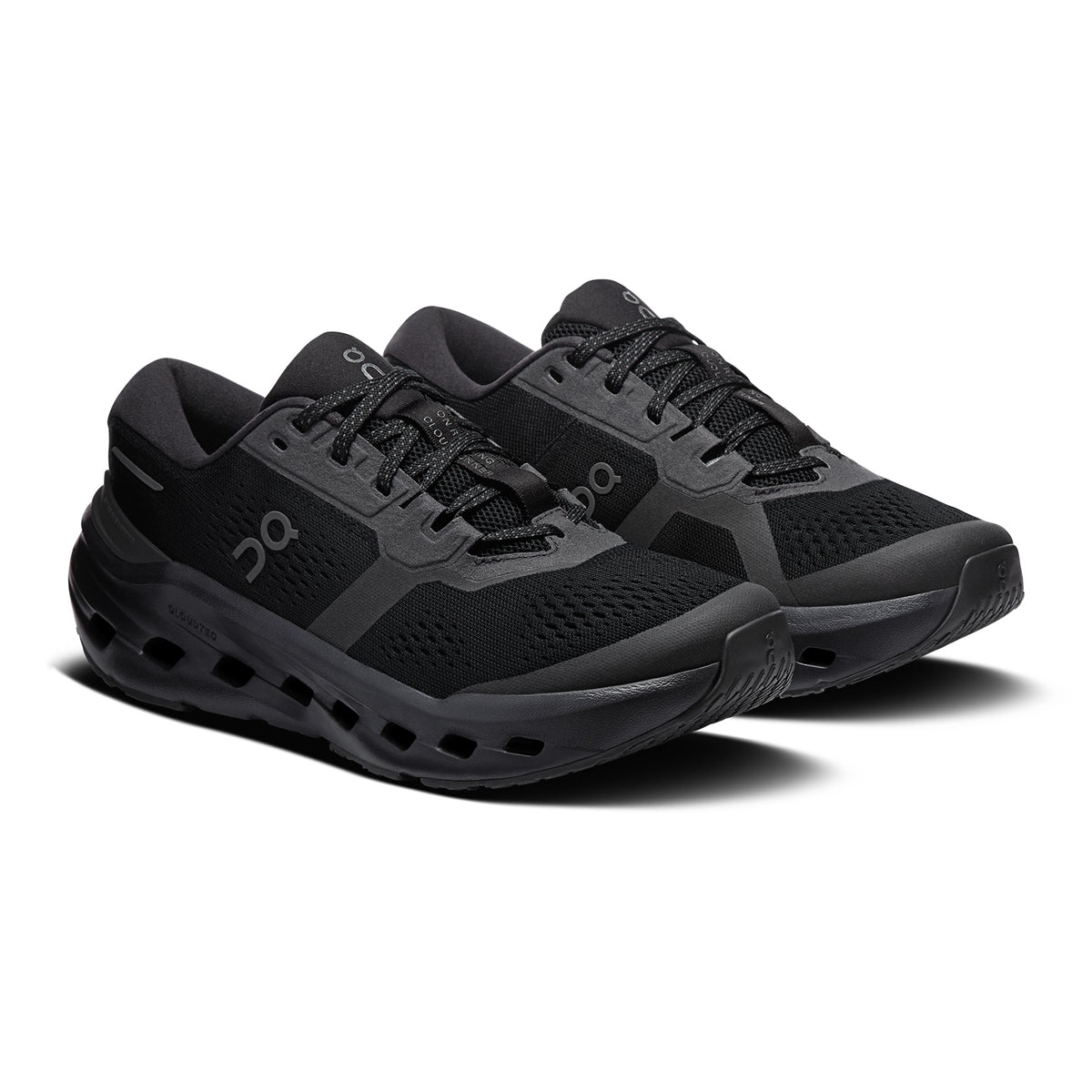 A pair of black athletic running shoes with mesh uppers, black laces, and chunky cushioned soles, displayed angled to the right on a white background.