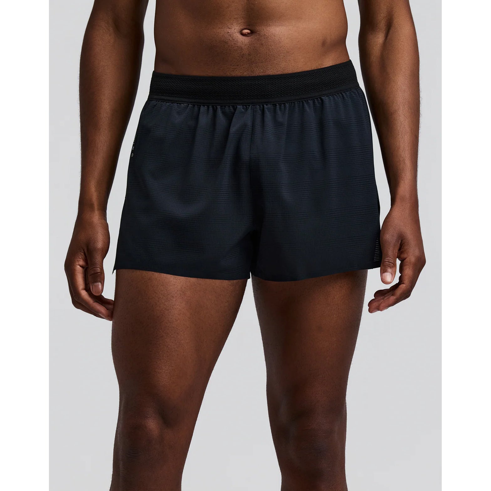 Men's Bandit CoolGrid 3 Inch Split Shorts Black front view on male runner showing mid-rise fit with two-tone mesh waistband and internal drawstring for adjustable comfort