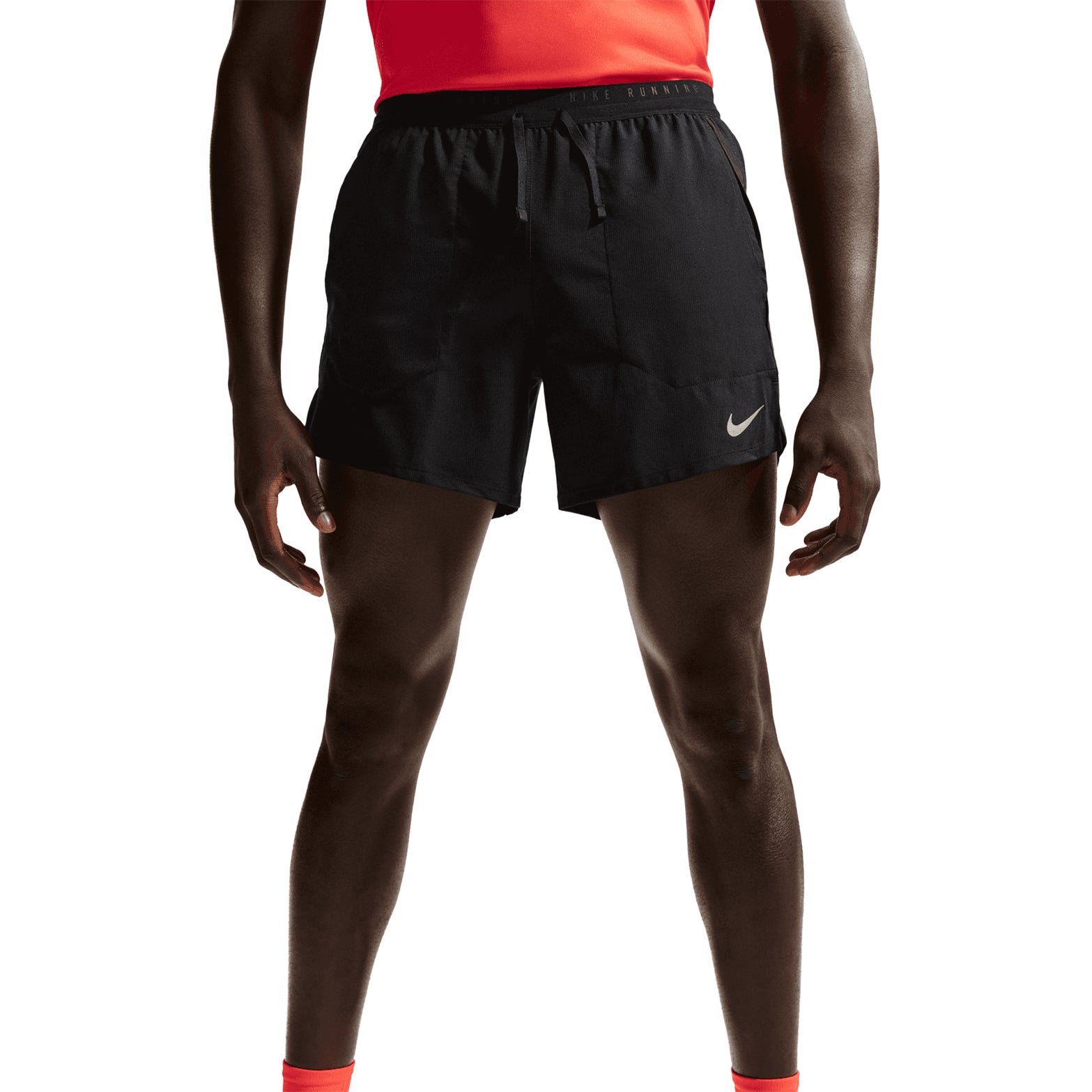 Men's Nike Dri-FIT Stride 5 Inch Shorts Black front view showing lightweight woven fabric with Dri-FIT moisture-wicking technology and narrow waistband with drawcord