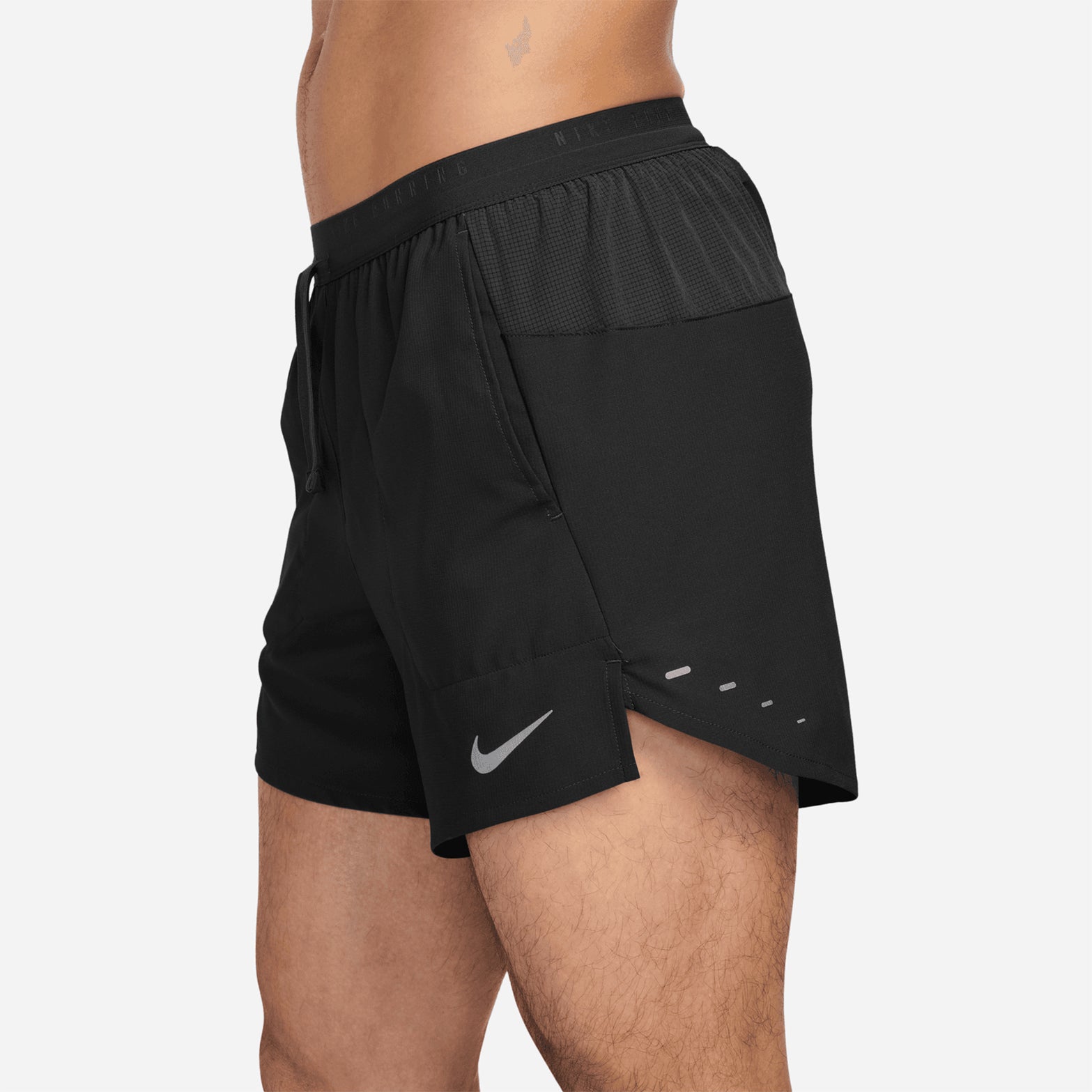 Men's Nike Dri-FIT Stride 5 Inch Shorts Black side close-up showing 5 inch inseam, shallow rise for unrestricted movement and ergonomic brief liner