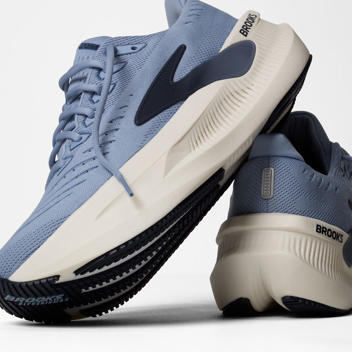 Brooks Glycerin Max 2 men's running shoe in Rain Washed / Navy Blazer / Clear — angled side view showing rain washed engineered mesh upper, GlideRoll™ Rocker toe spring geometry and navy blazer nitrogen-infused DNA TUNED maximum stack height midsole