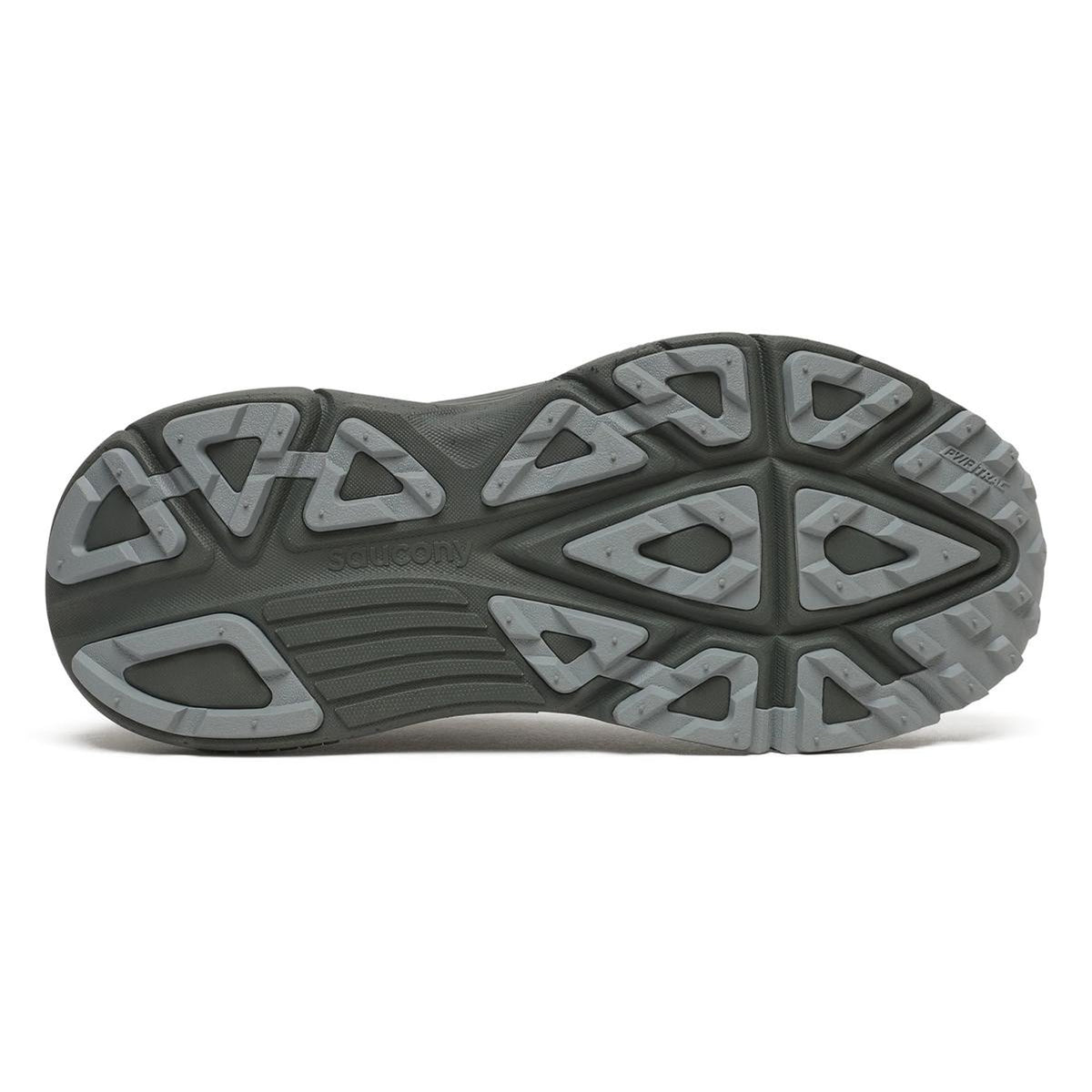 Gray rubber outsole of a Saucony Men’s Guide TR GORE-TEX Fatigue trail running shoe, featuring triangular tread patterns and a central brand logo.