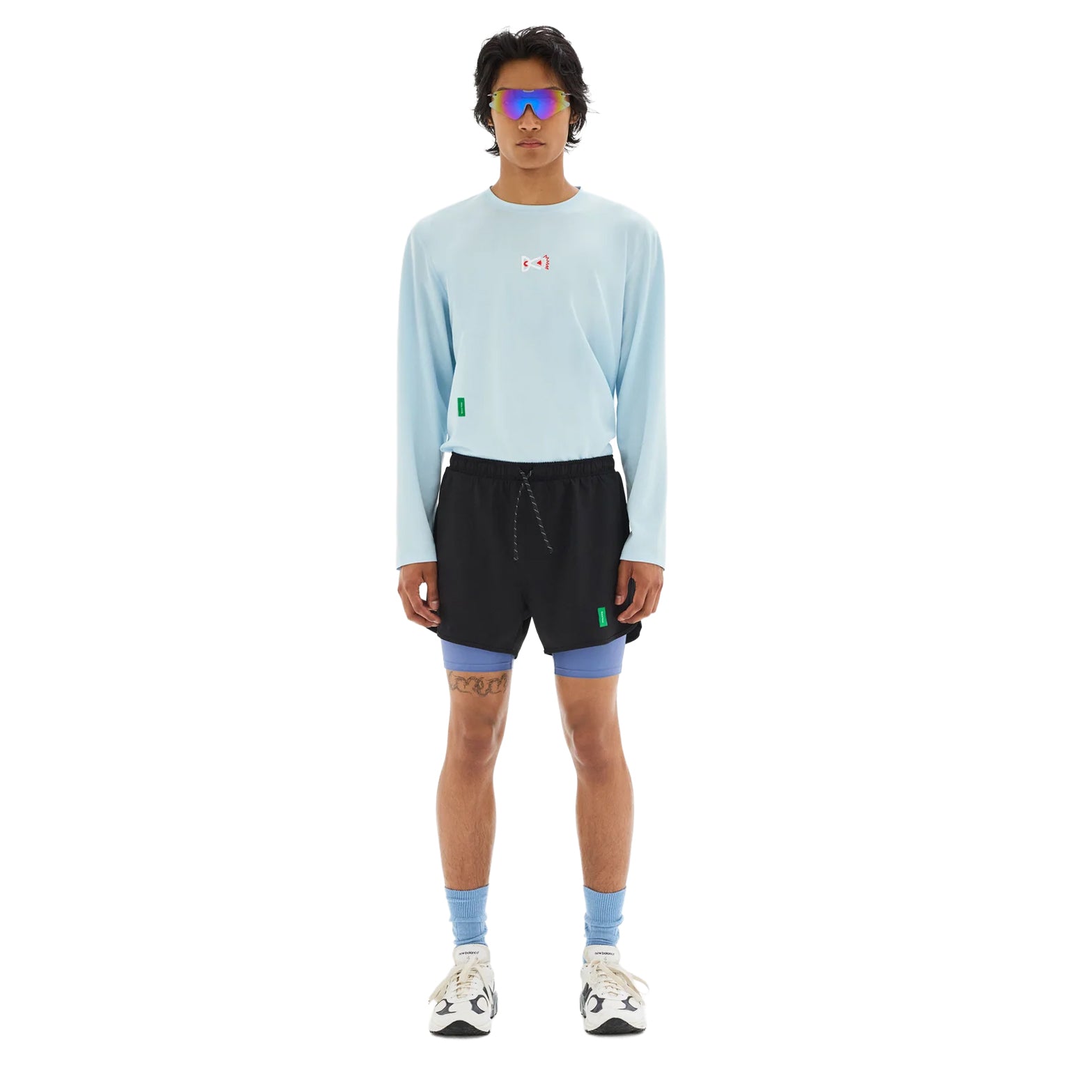 District Vision Men's Layered Training Shorts Black Race Blue full body view on male runner showing 3-inch split short with deep side splits for increased airflow and ease of motion
