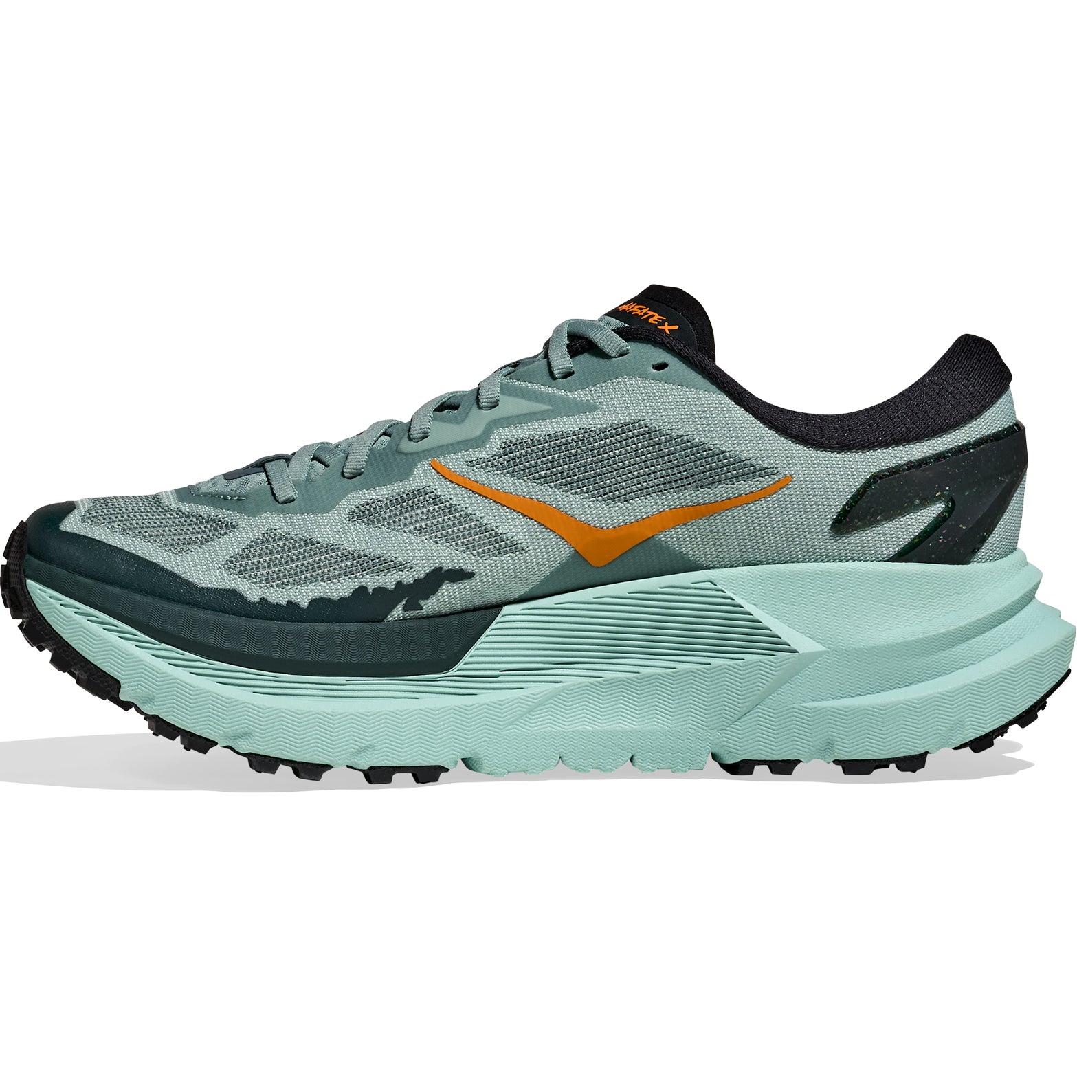 HOKA Mafate X men's trail running shoe in Sage / Rosemary — inner view showing sage woven textile upper, rosemary midsole detailing, TPU heel counter and dual-density foam chassis construction