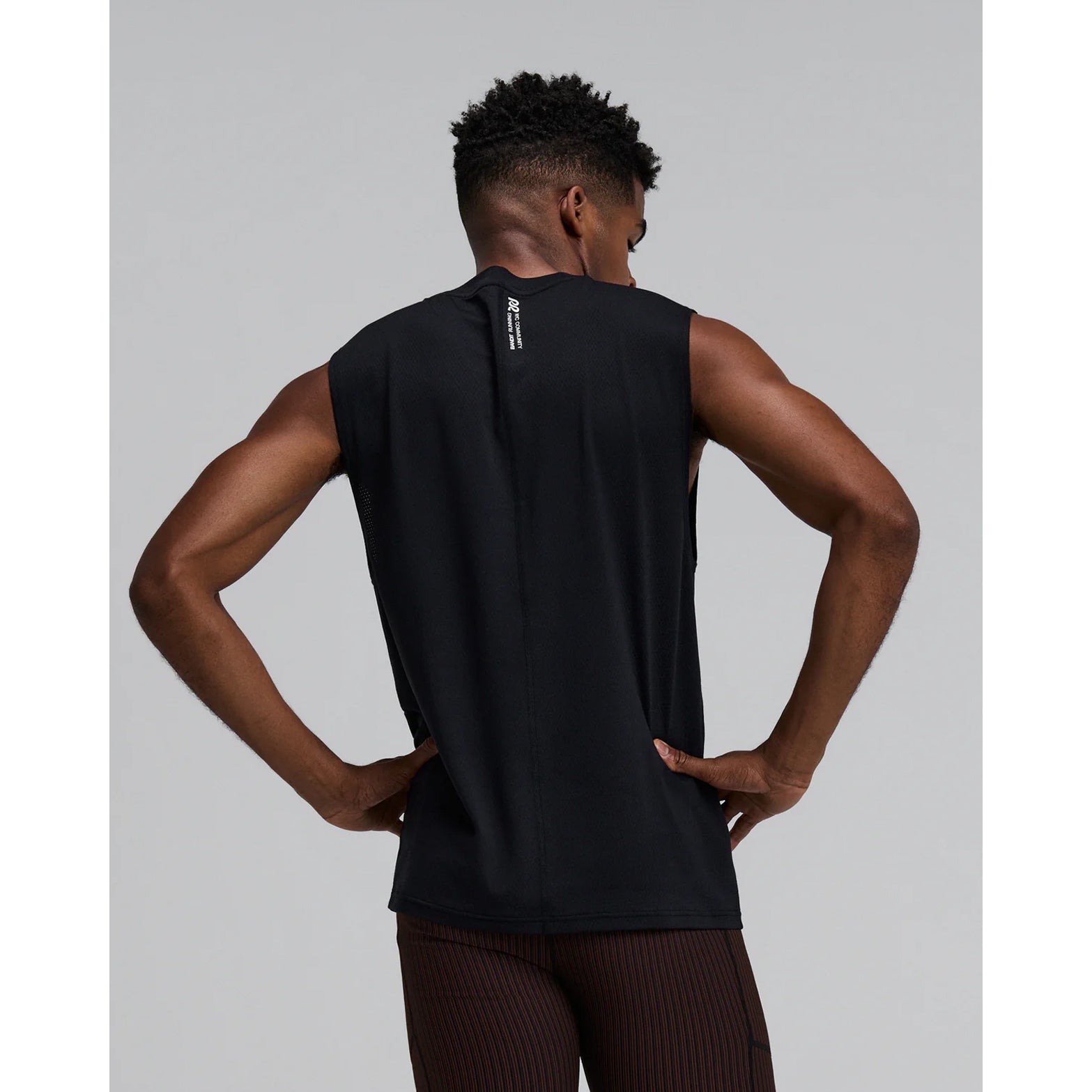 Men's Bandit Micromesh Run Tank Black back view on male runner showing breathable Micromesh construction with fast-drying sweat-wicking fabric for comfortable running
