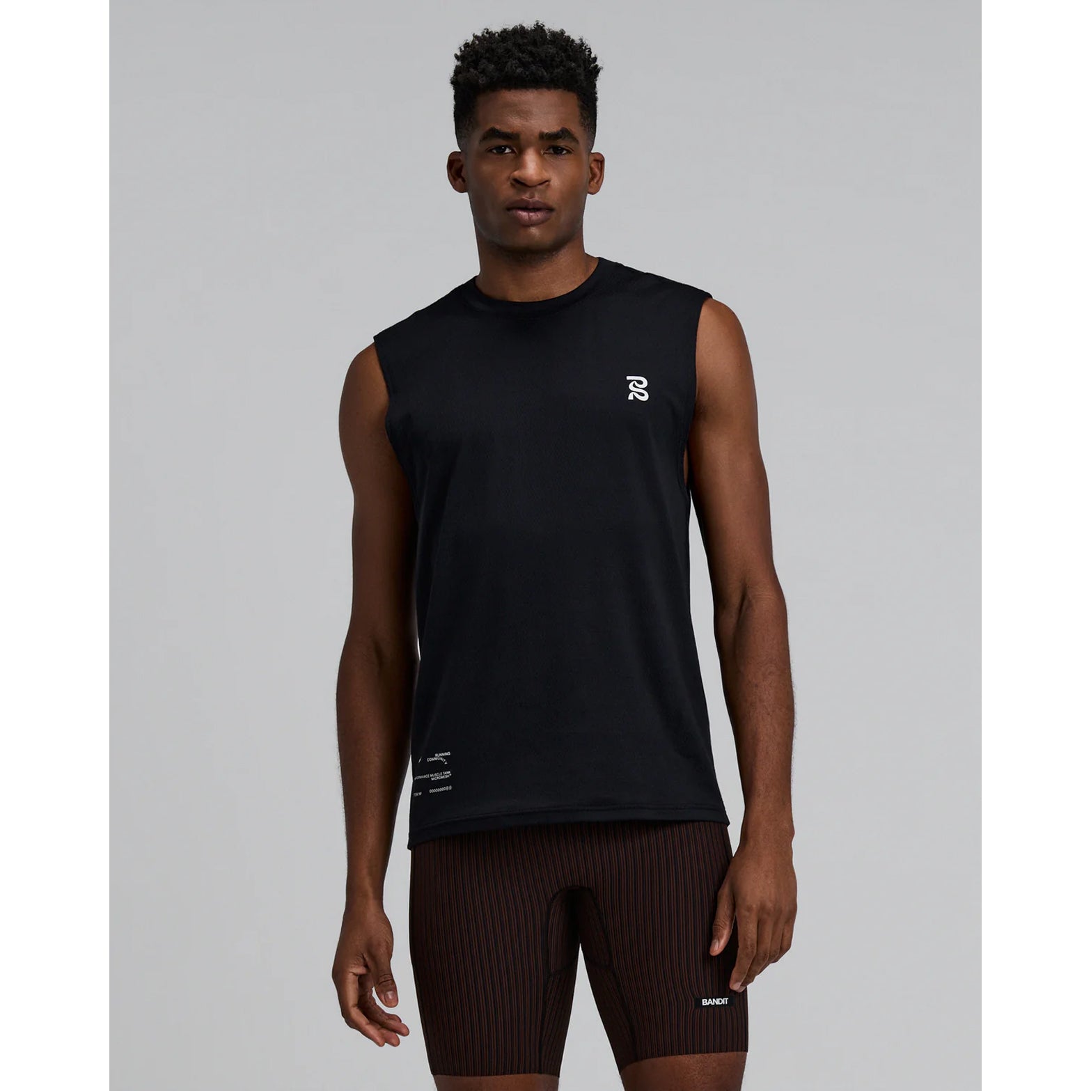 Men's Bandit Micromesh Run Tank Black front view on male runner showing comfortable tank fit with breathable Micromesh construction for running and training
