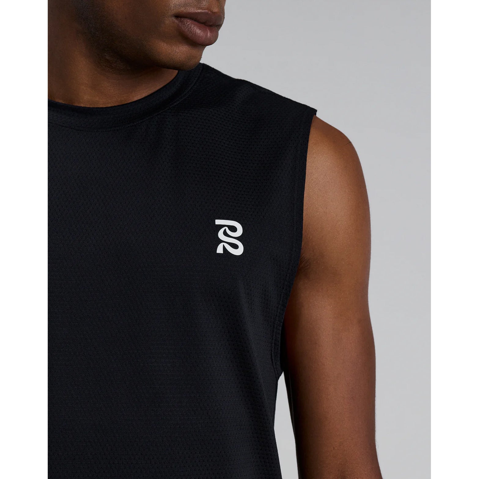 Men's Bandit Micromesh Run Tank Black close-up of front showing subtle two-tone Bandit logo branding with ultra-breathable Micromesh fabric and Oeko-Tex certified BPA-free construction