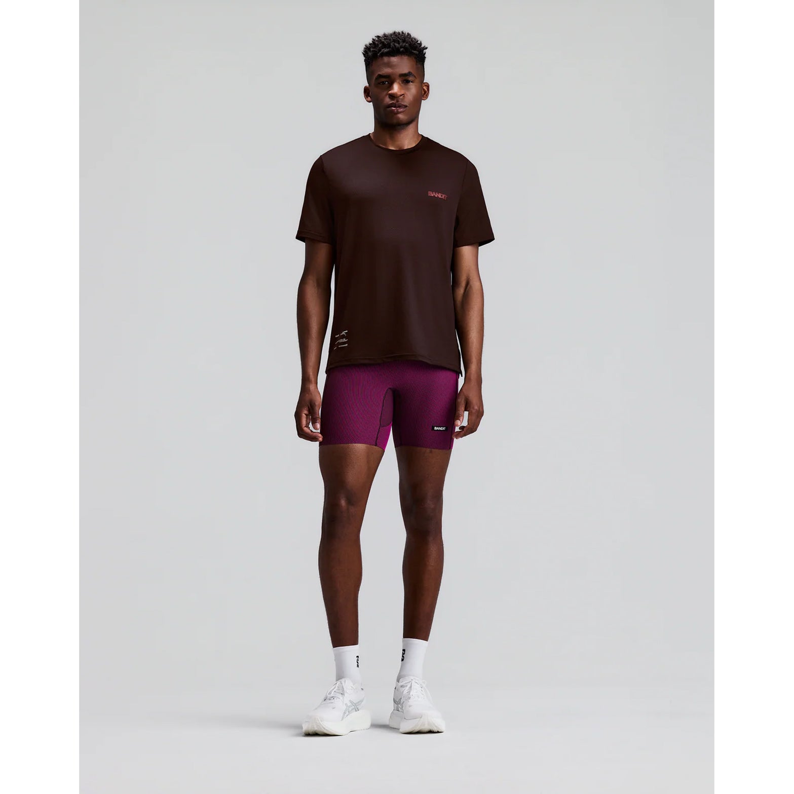 Men's Bandit Micromesh Run Tee Espresso front full body view on male runner showing comfortable fit with crew neckline and breathable Micromesh moisture-wicking for training and everyday running