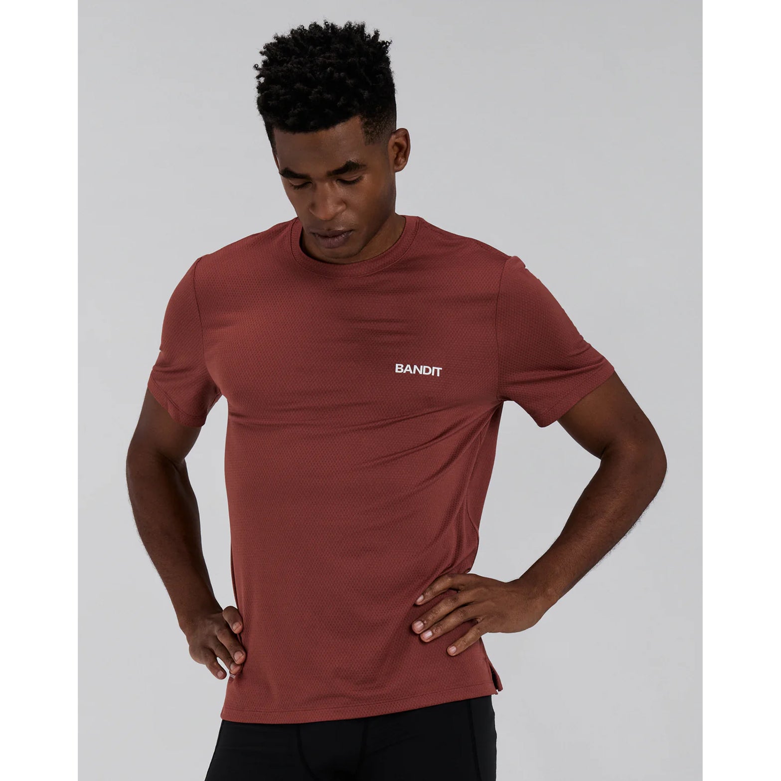 Men's Bandit Micromesh Run Tee Mahogany front view showing relaxed silhouette with sweat-wicking Oeko-Tex Certified mesh and reflective graphic at centre front