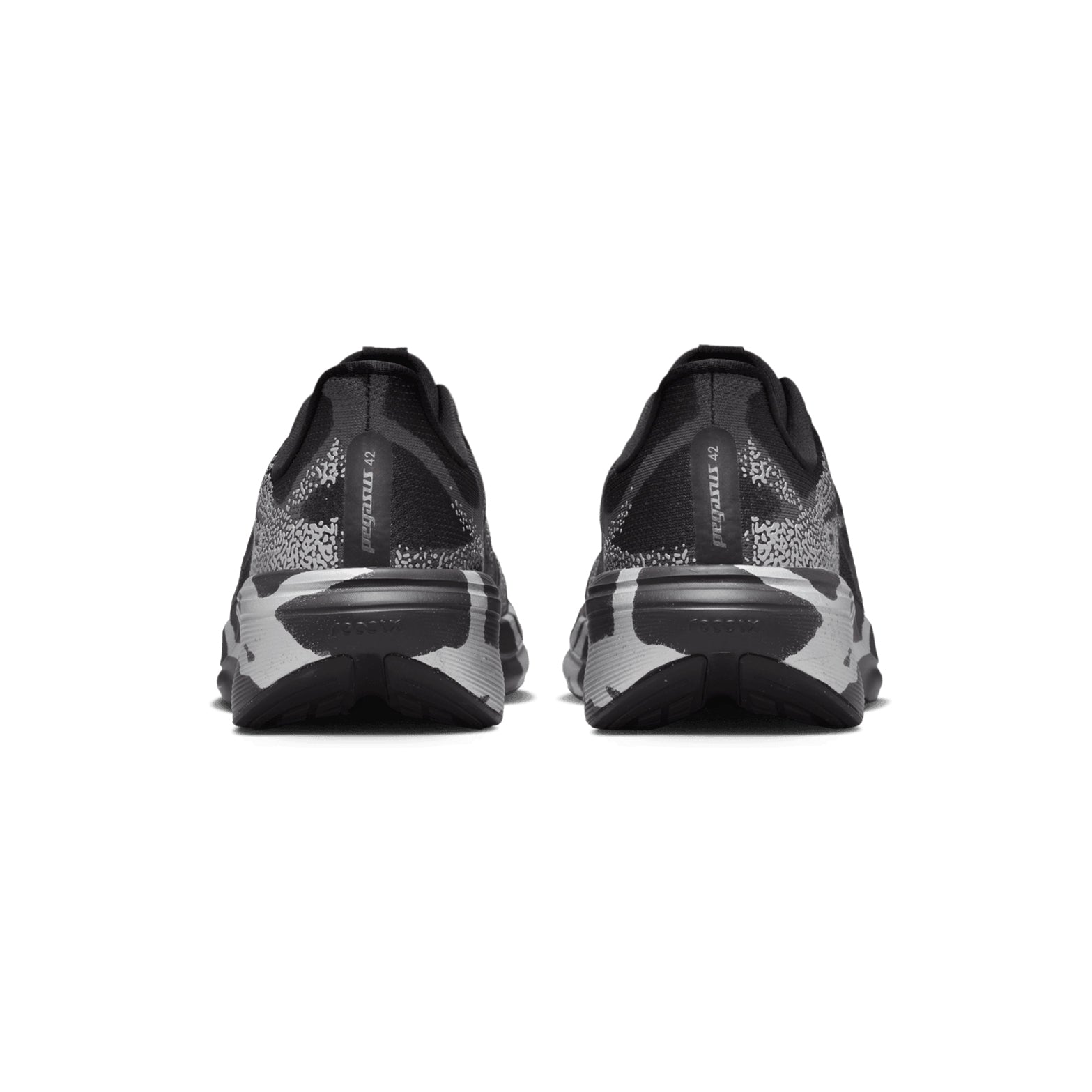 Nike Pegasus 42 men's running shoe in Black / Medium Ash / Metallic Silver — heel view showing padded collar construction, metallic silver heel detailing and full-length Air Zoom ReactX midsole contrast