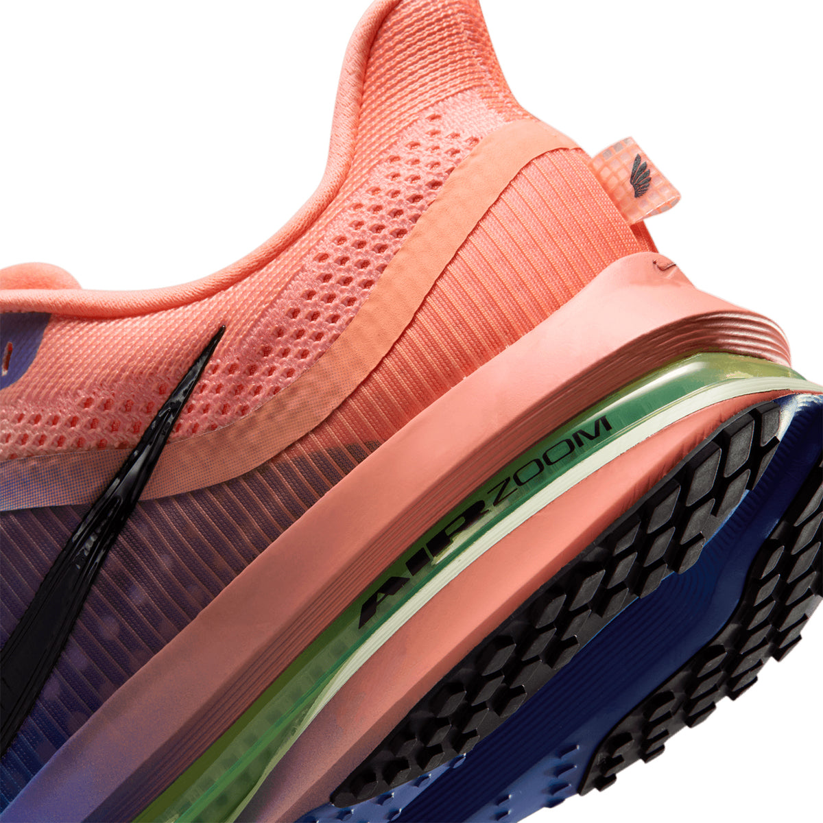 Men's Nike Pegasus Premium Running Shoes Racer Blue Atomic Pink Volt Tint angled side and heel view showing Air Zoom units surrounded by ZoomX foam for plush springy daily road running
