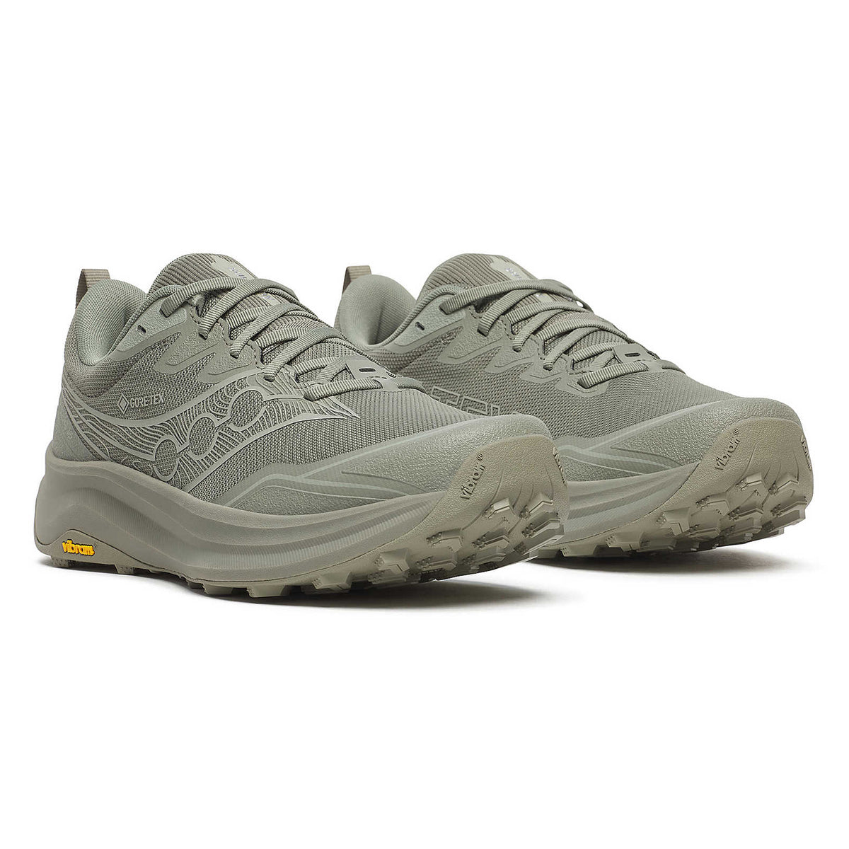 A pair of light gray trail running shoes with textured soles and mesh uppers, viewed from a front-side angle, showing detailed tread and laces.