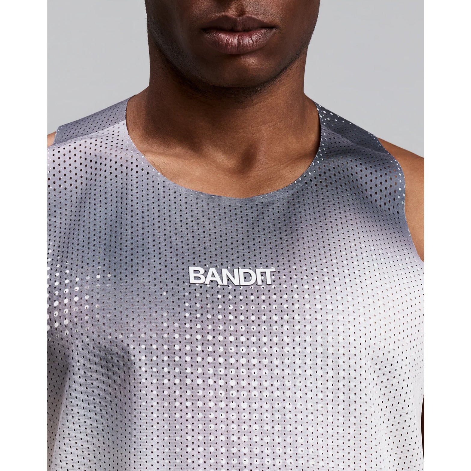 Men's Bandit Shredder Race Singlet with Flopack Slate Multi close-up of front showing Shredder gradient mesh with bonded seams and two-tone reflective Bandit graphics