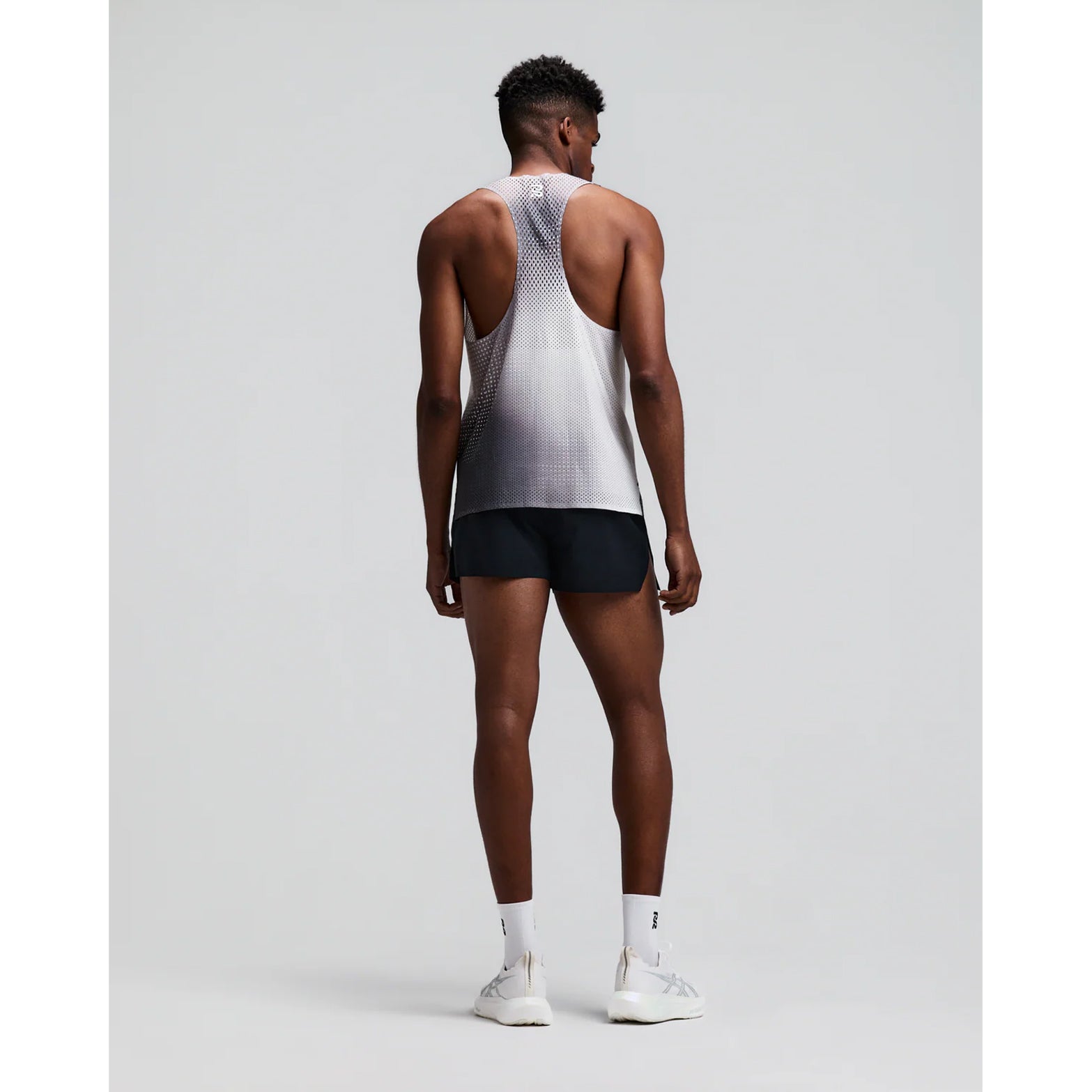 Men's Bandit Shredder Race Singlet with Flopack Slate Multi back full body view on male runner showing Flopack airflow technology with racer back design and side slits for freedom of movement during racing