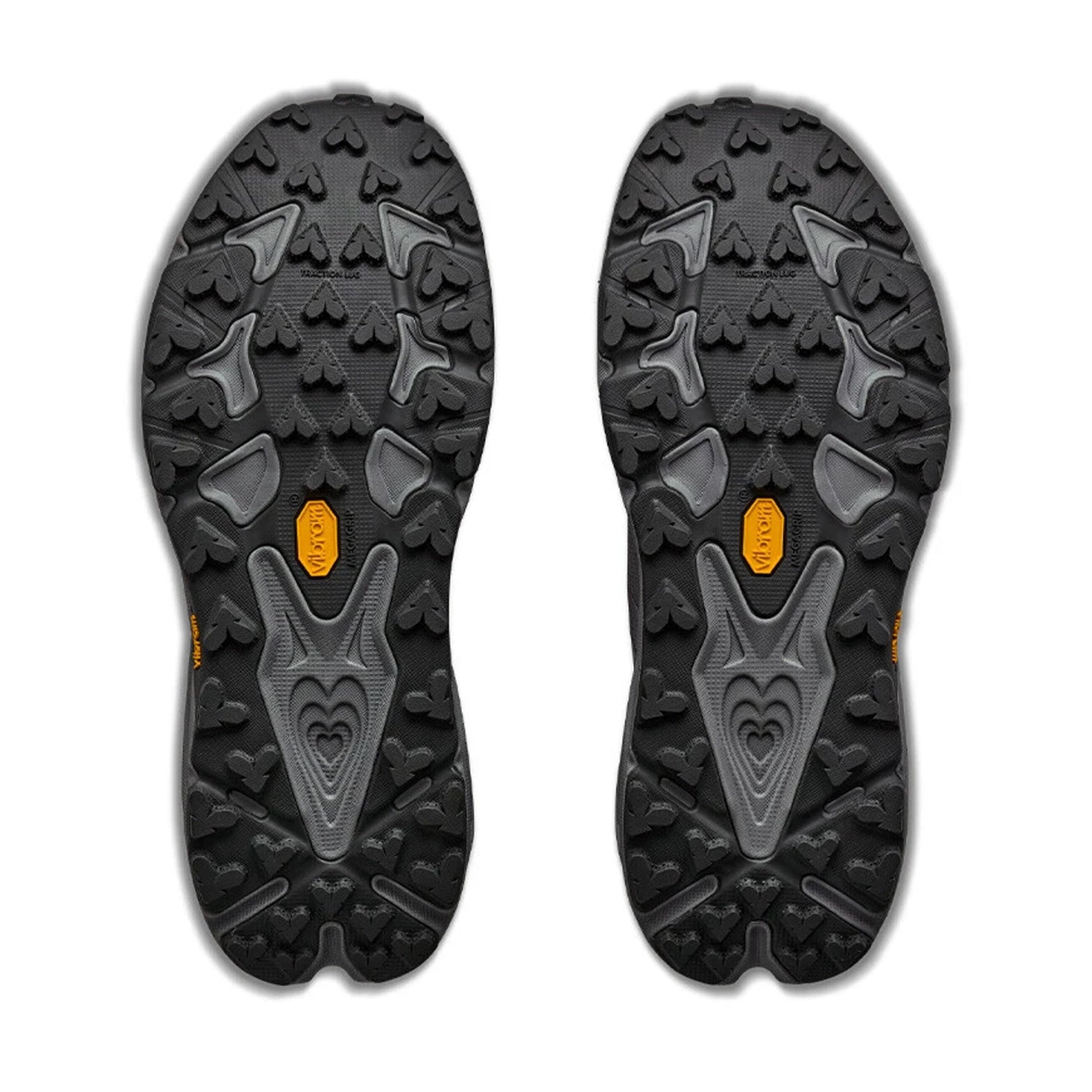A pair of black and gray shoe soles featuring heart-shaped tread patterns and orange Vibram logos at the arches are shown side by side on a white background—designed specifically for the Hoka Men’s Speedgoat 7 GORE-TEX Trail Running Shoes in Asteroid / Galactic Grey, these soles offer dependable grip and long-lasting durability for waterproof trail footwear.