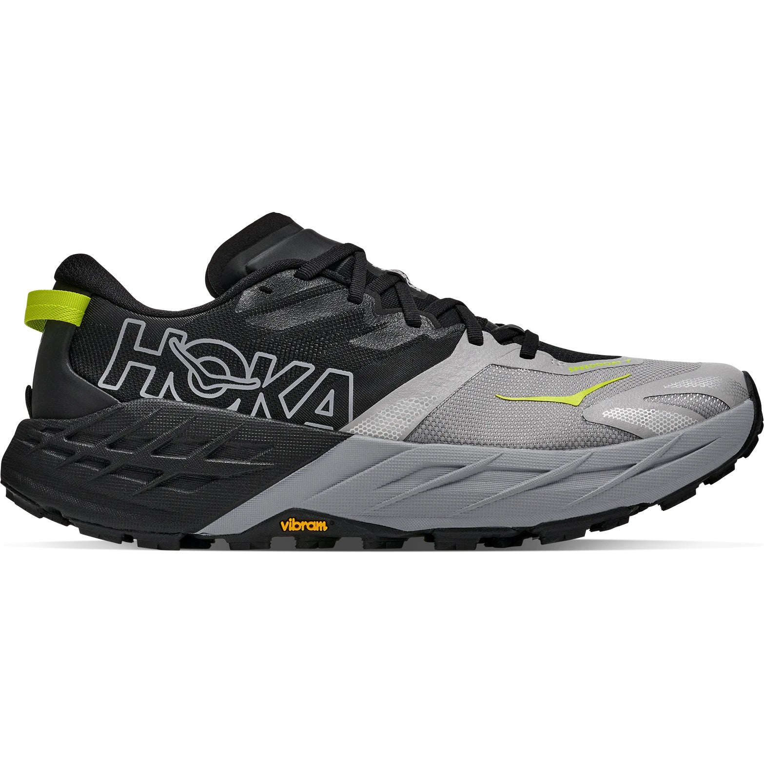 Men's HOKA Speedgoat 7 Trail Running Shoes Black Stellar Grey outer side view showing maximum cushioned midsole with Vibram Megagrip outsole and aggressive lugs for technical trail running