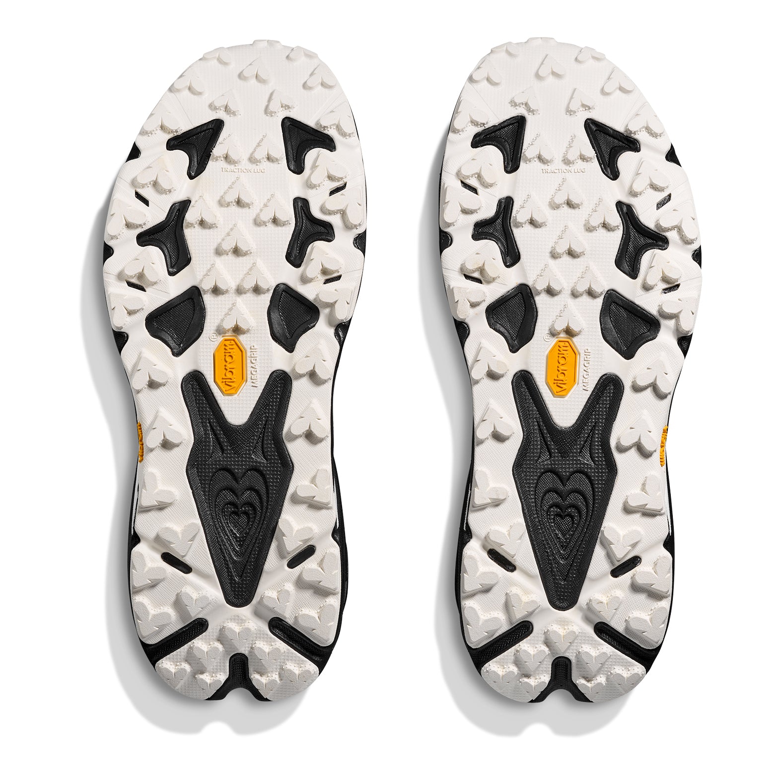Men's Speedgoat 7 Wide Fit Trail Running Shoes Black White sole view displaying 5mm Vibram® Megagrip traction lugs
