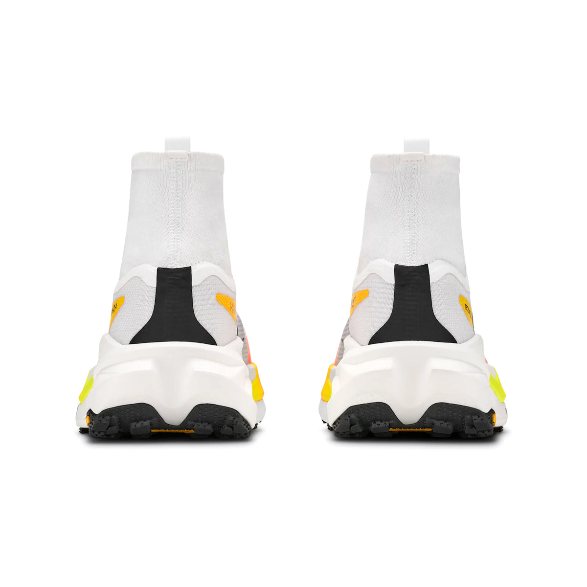 Two white high-top Hoka Men’s Tecton X 4 Trail Running Shoes in Frost / Neon Tangerine are shown from the back. Inspired by trail running shoe design, they feature black, yellow, and orange accents, chunky soles with carbon plate technology for enhanced performance, and fabric heel tabs. The background is plain and white.