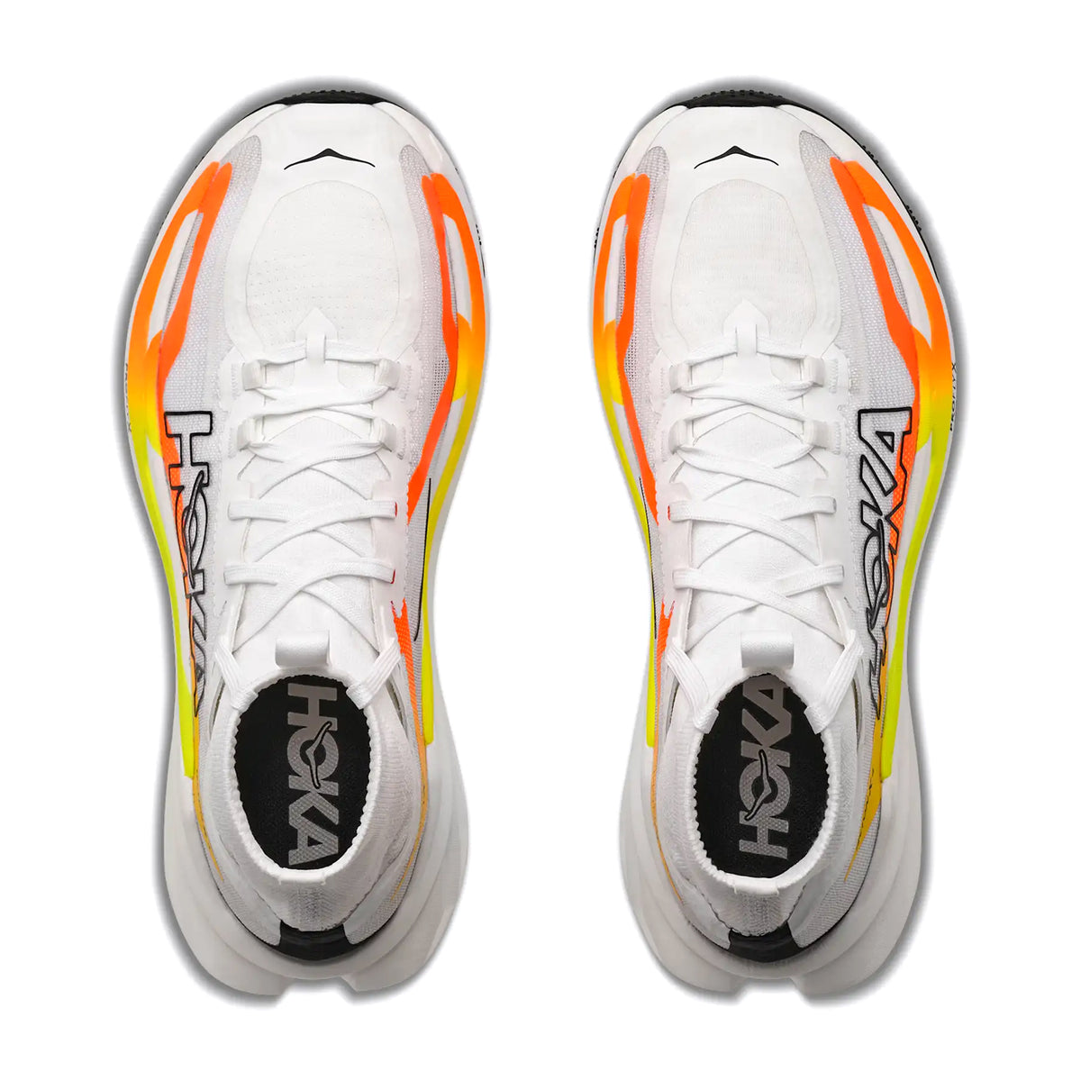 Top view of a pair of Men’s Tecton X 4 Trail Running Shoes by Hoka in Frost / Neon Tangerine, showcasing white uppers with orange and yellow gradient accents on the sides, advanced carbon plate technology for enhanced propulsion, and Hoka branding on the tongue and outer sides.