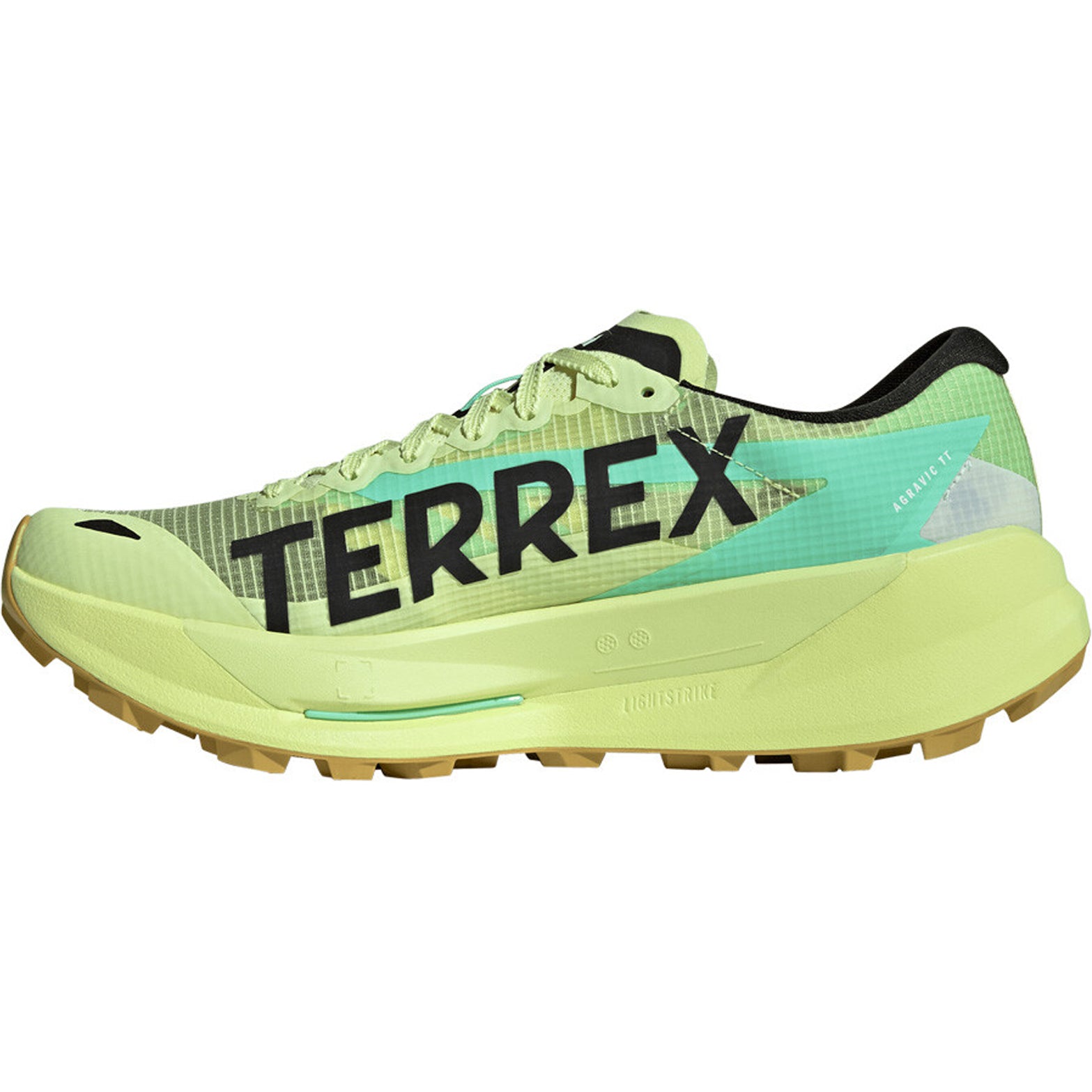 Men's adidas Terrex Agravic TT Trail Running Shoes Frozen Lemon Core Black Pulse Mint inner side view showing responsive LIGHTSTRIKE PRO midsole with trail-gripping outsole for rocky terrain