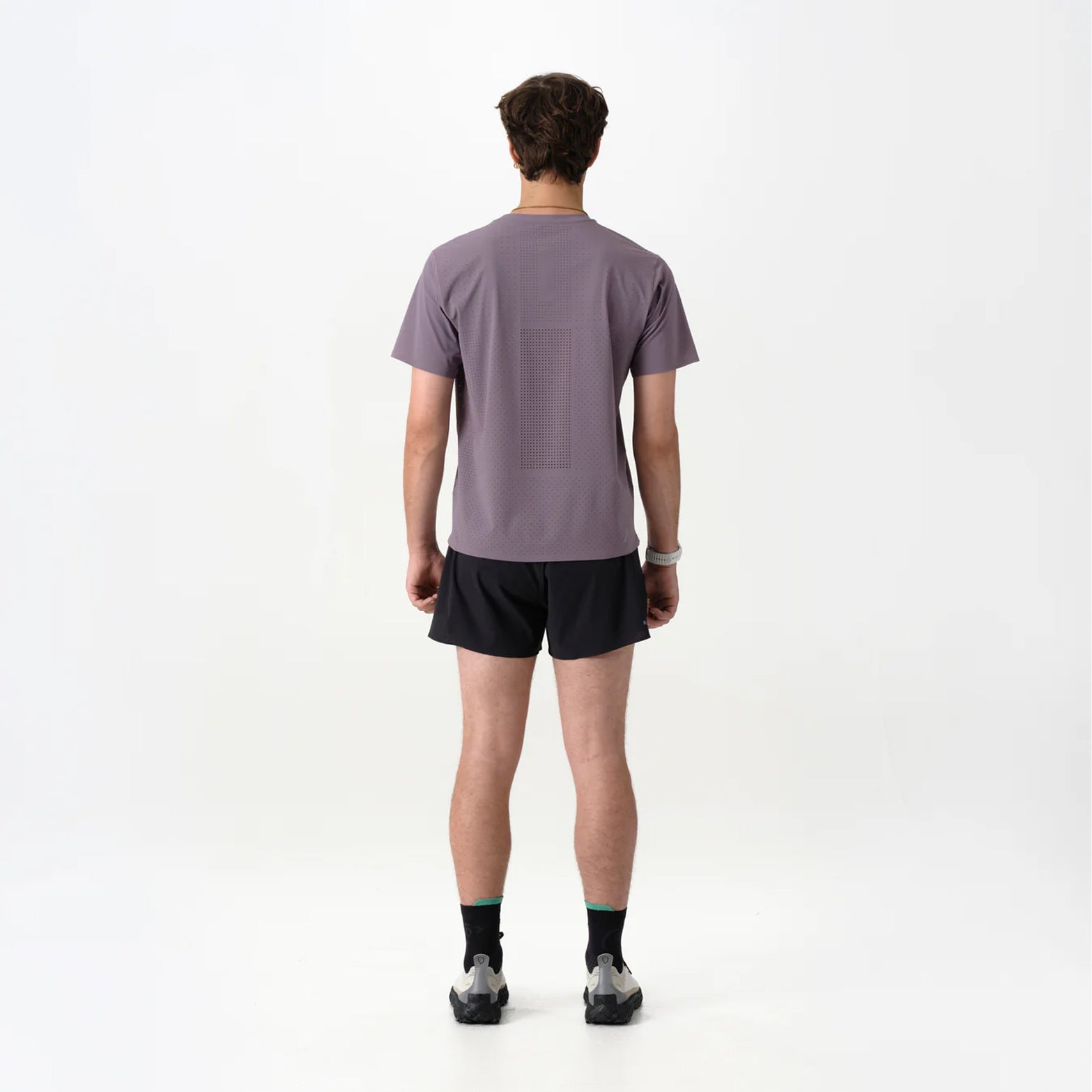 Men's Raide Thermal Dispersion Tee Dusk back full body view on male runner showing body-mapped centre back perforations with reflective branding and Italian-knit microfibre for evaporative cooling during road running