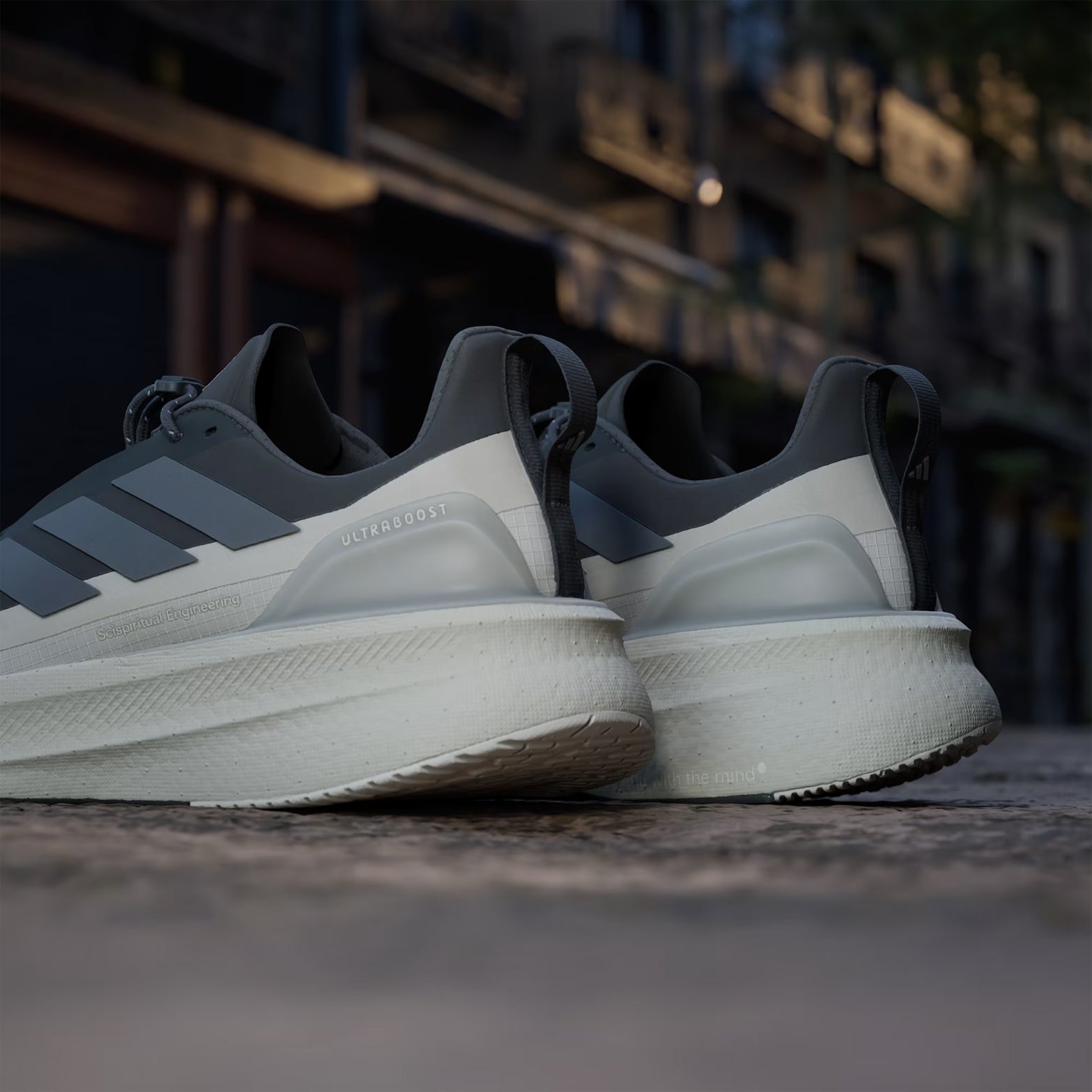 Men's adidas Ultraboost 5 H.Koumori Running Shoes Carbon Grey Five Alumina close up heel view showing Light BOOST midsole detail and Hermanos Koumori design elements