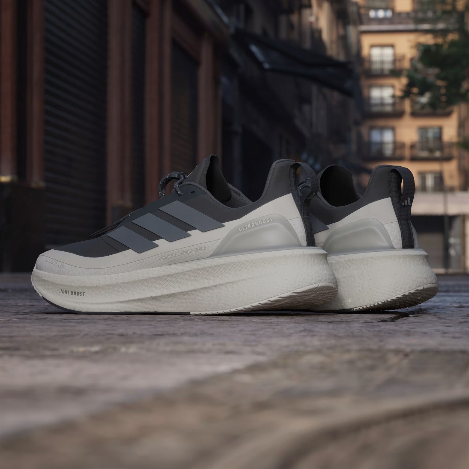 Men's adidas Ultraboost 5 H.Koumori Running Shoes Carbon Grey Five Alumina angled side heel view showing Light BOOST energy return cushioning and heel construction