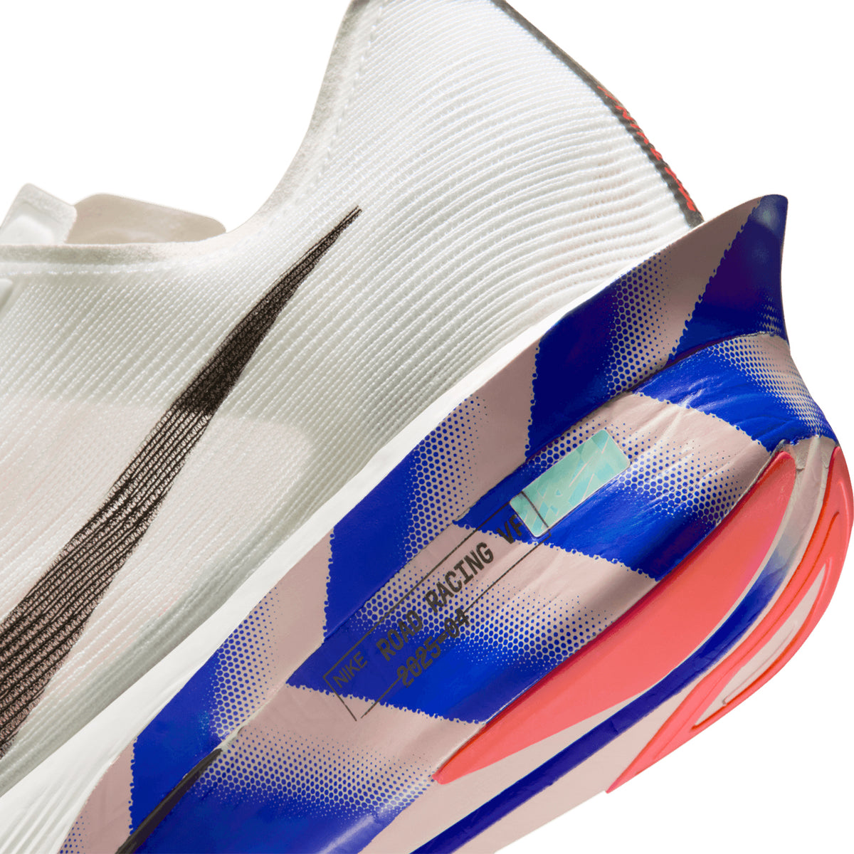 Nike Vaporfly 4 men's running shoe in White / Racer Blue / Silt Red / Black — angled side view showing white engineered mesh upper, silt red and racer blue accent detailing and full-length carbon fibre Flyplate ZoomX midsole stack with increased plate angle profile