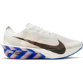 Nike Vaporfly 4 men's running shoe in White / Racer Blue / Silt Red / Black — outer view showing white engineered mesh upper with racer blue and silt red accent detailing, black contrast and full-length carbon fibre Flyplate ZoomX midsole profile