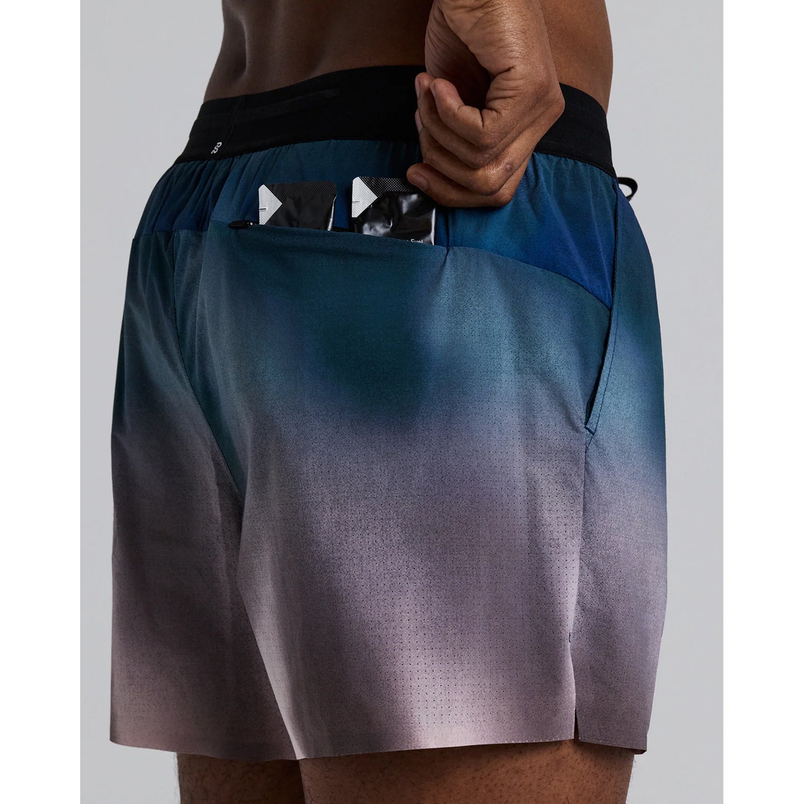Bandit Vento™ 5 Inch Run Shorts men's in Flow State Aegean Multi — closeup showing waterproof phone pocket, gel pocket placement and stash pocket within the flow state aegean multi Vento™ waistband construction