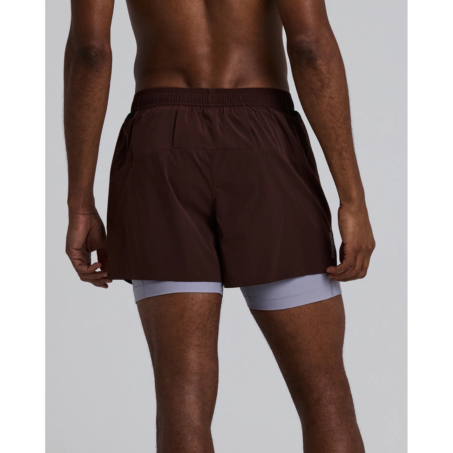 Men's Bandit Vento Next Gen 2-in-1 Run Short Cacao back view showing 2 waterproof phone pockets, gel storage and ride-up prevention grip technology