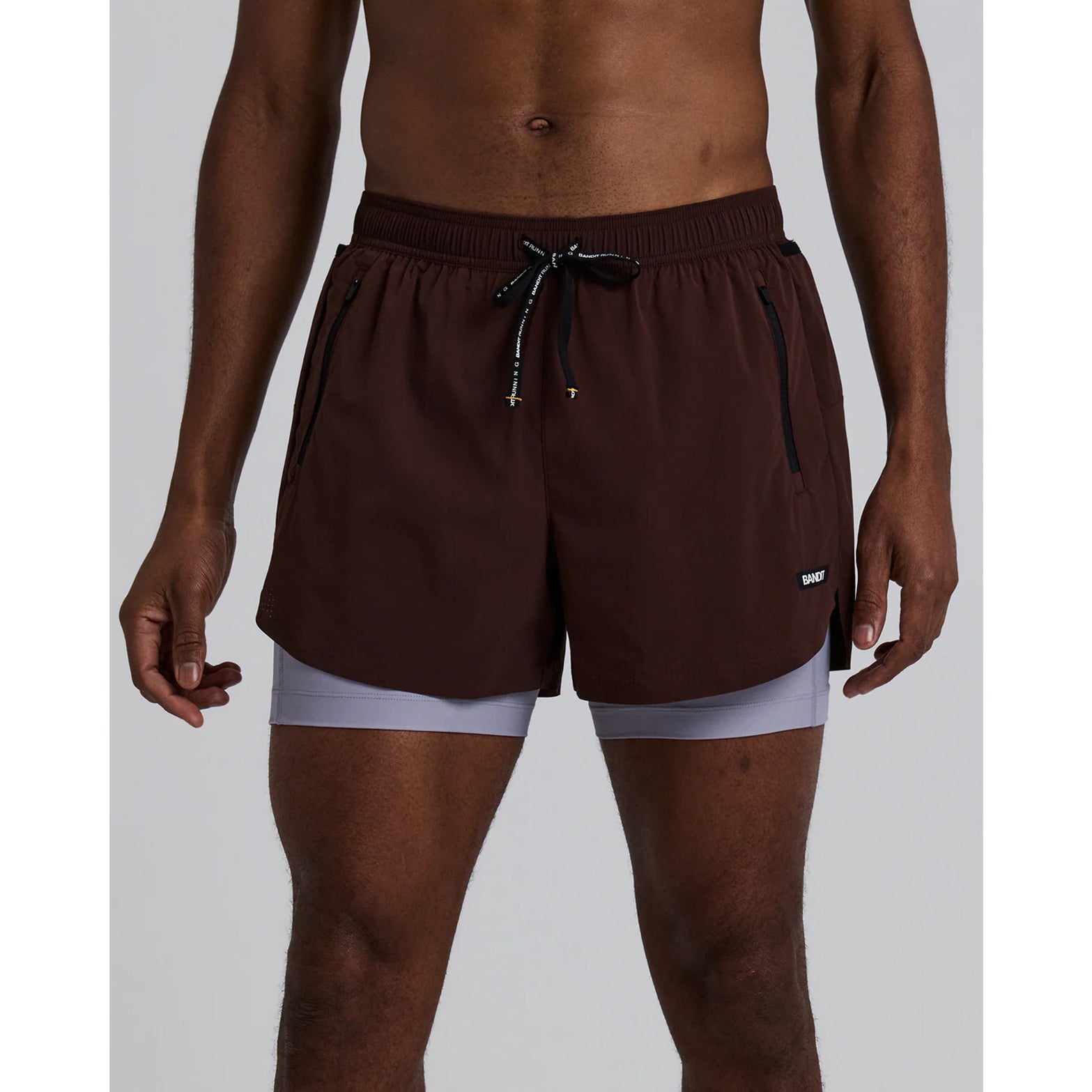 Men's Bandit Vento Next Gen 2-in-1 Run Short Cacao front view showing built-in compression liner with reflective branding and breathable construction