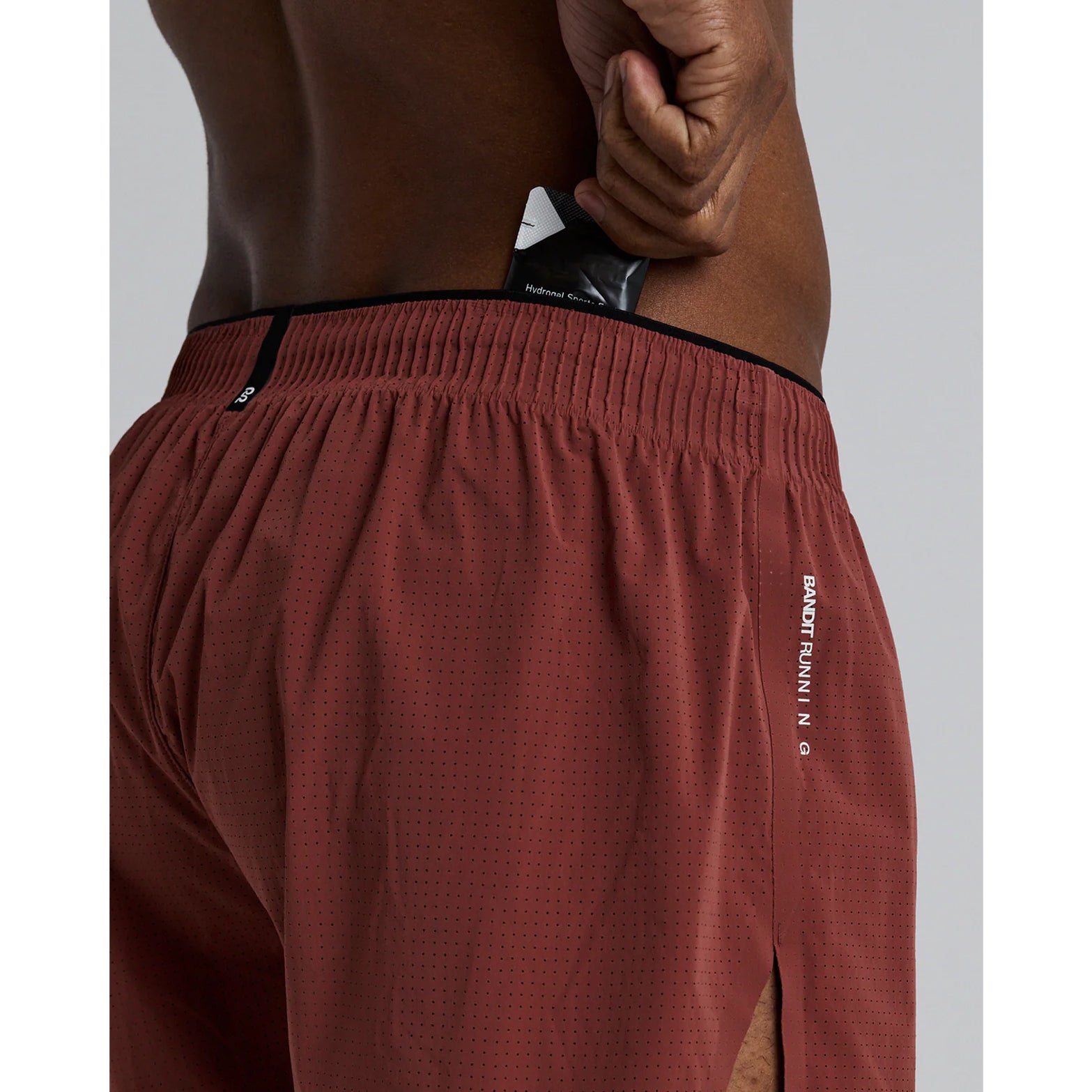 Men's Bandit Vento Next Gen 3 Inch Split Short Mahogany shot of gel pockets and key pocket showing comprehensive nutrition storage system