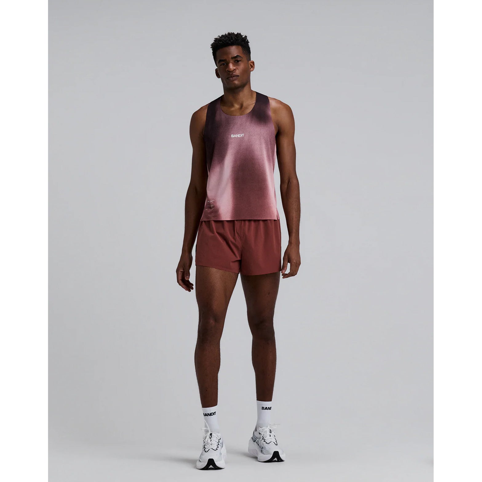 Men's Bandit Vento Next Gen 3 Inch Split Short Mahogany full body front view on male runner showing 3 inch split shorts with breathable Vento fabric and Coolcore brief liner