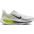 Introducing the Nike Men’s Vomero 18 Running Shoes in Photon Dust, Black, and Volt—white mesh upper with a bold black swoosh, highlighted by lime green (Volt) and gray accents. These everyday trainers feature a thick ZoomX-labeled sole with dual-density cushioning for unrivaled comfort.