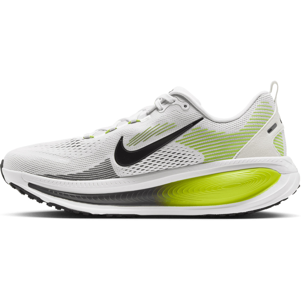 Nike Men’s Vomero 18 Running Shoes in Photon Dust, Black, and Volt feature a breathable mesh upper, black Nike swoosh, lime green (Volt) accents on the heel and midsole, and a white outsole. Designed as an everyday trainer, they offer dual-density cushioning for enhanced comfort and performance.