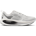 Nike Vomero 18 men's running shoe in Summit White / Black / Off White / Metallic Silver — outer view showing summit white engineered mesh upper with black detailing, metallic silver accent and dual-density ZoomX ReactX midsole profile